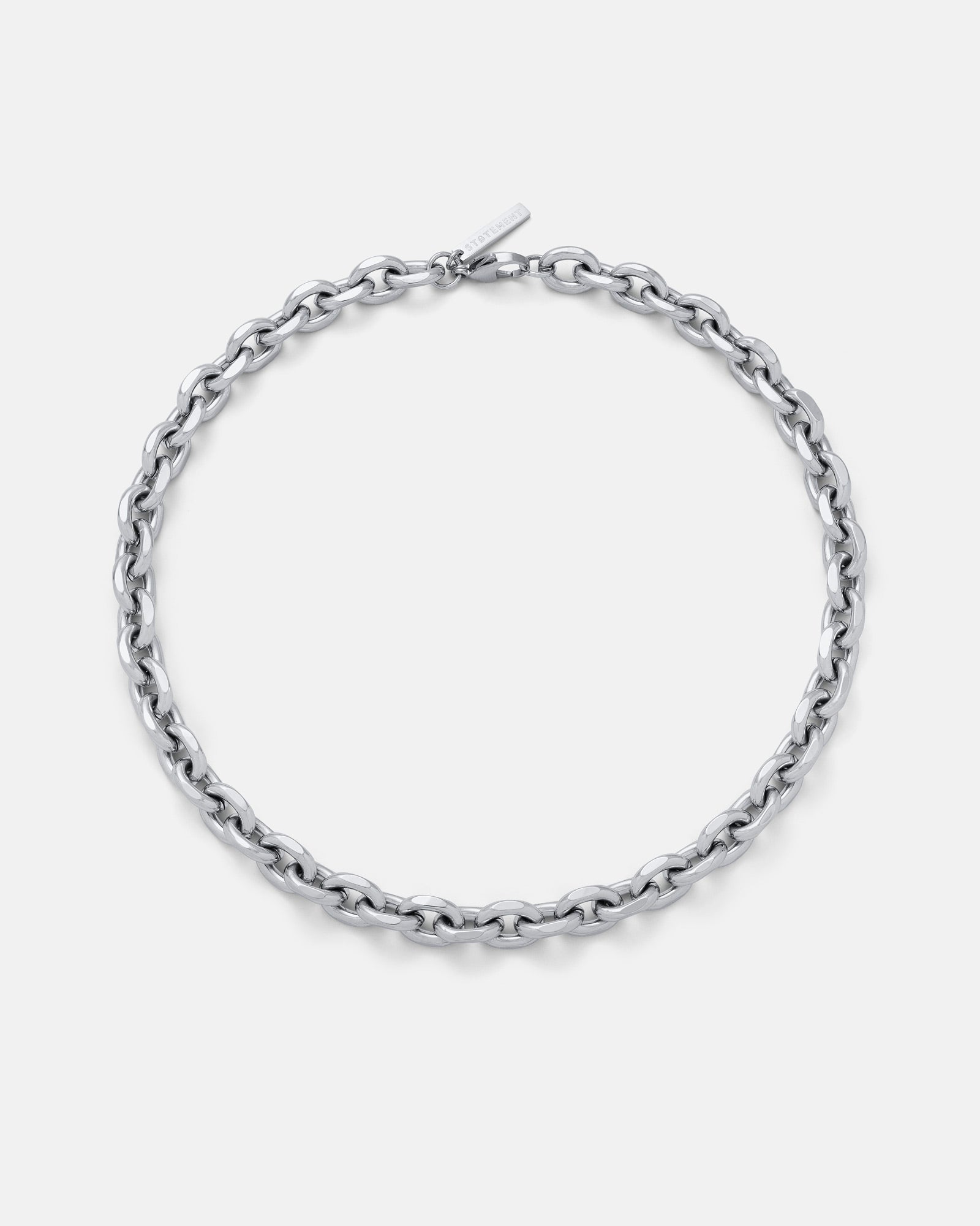 The 10mm Cable Chain, featuring large silver oval links, is displayed in a circle on a plain white background—ideal for bold streetwear style.