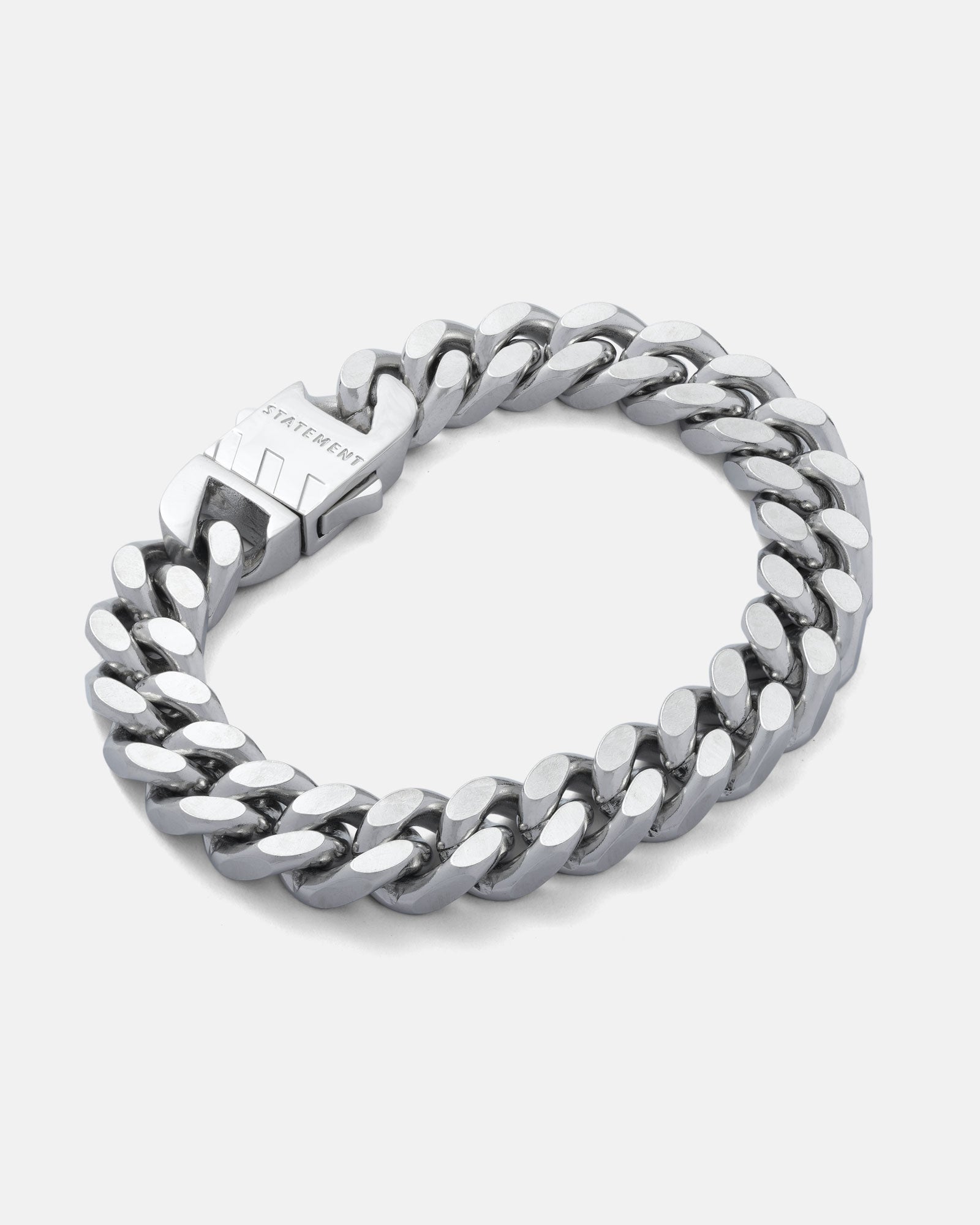 Silver 11mm Cuban bracelet by statement collective on grey background