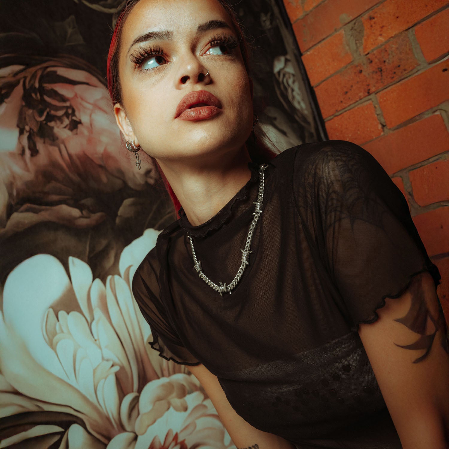 Sterling Silver 6mm Barbed wire chain on female model in mesh shirt