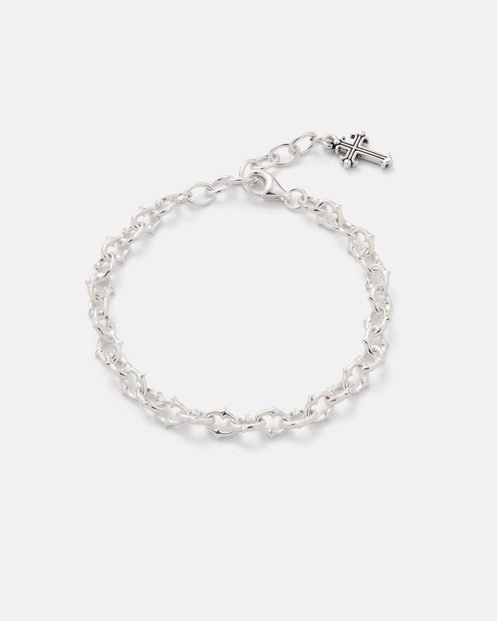 Introducing the Statement Collective 925 Sterling Silver "The Cathedral" 6mm Spiked Bracelet, featuring bold interlocking links and striking spiked detailing, elegantly displayed on a plain white background.