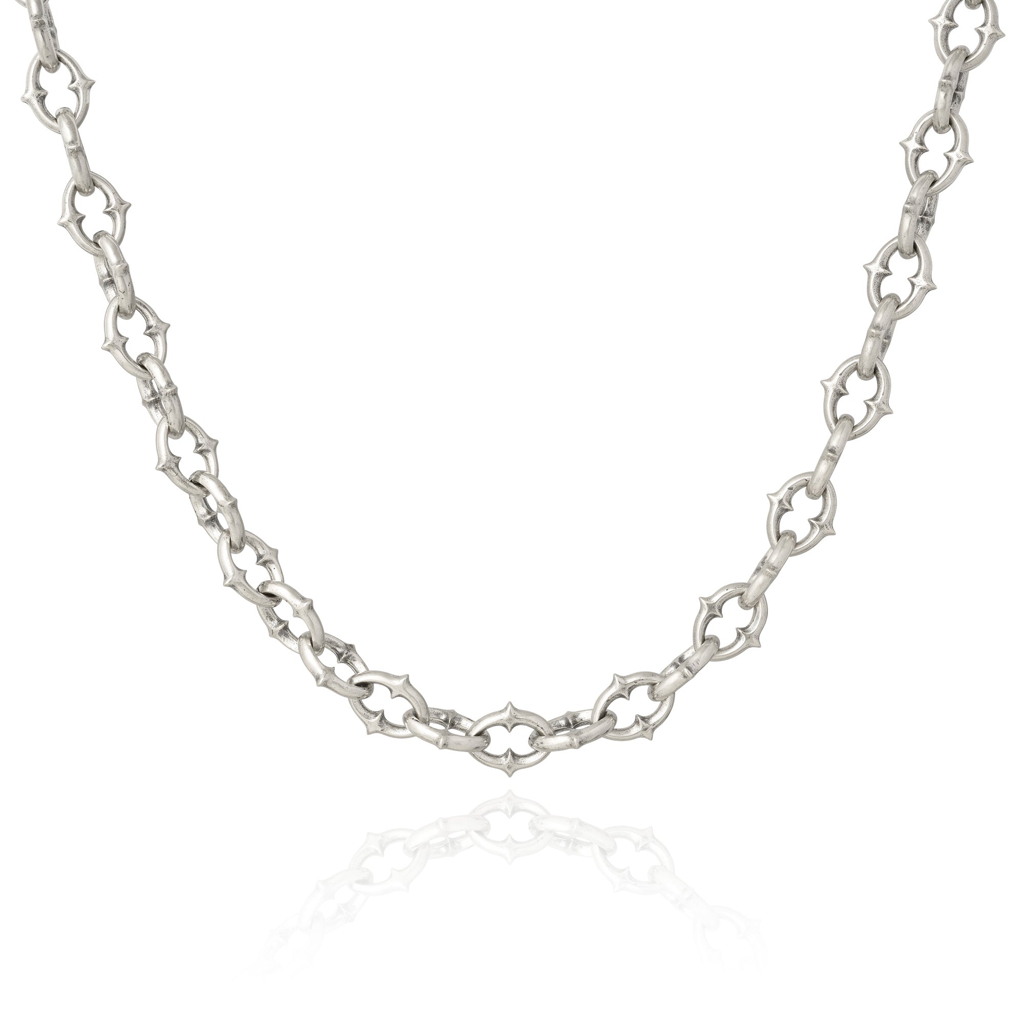 medieval spiked chain in sterling silver on white background by statement collective
