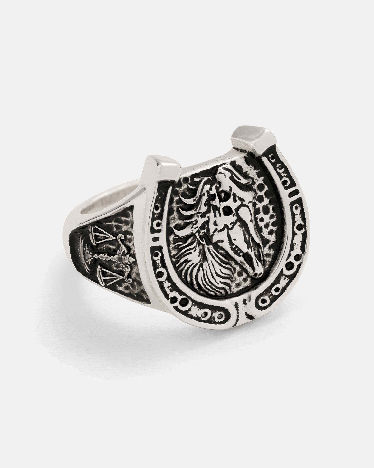 925 Sterling Silver Bronco Ring featuring a horseshoe shape framing a horse head relief, with decorative gothic symbols on the side.