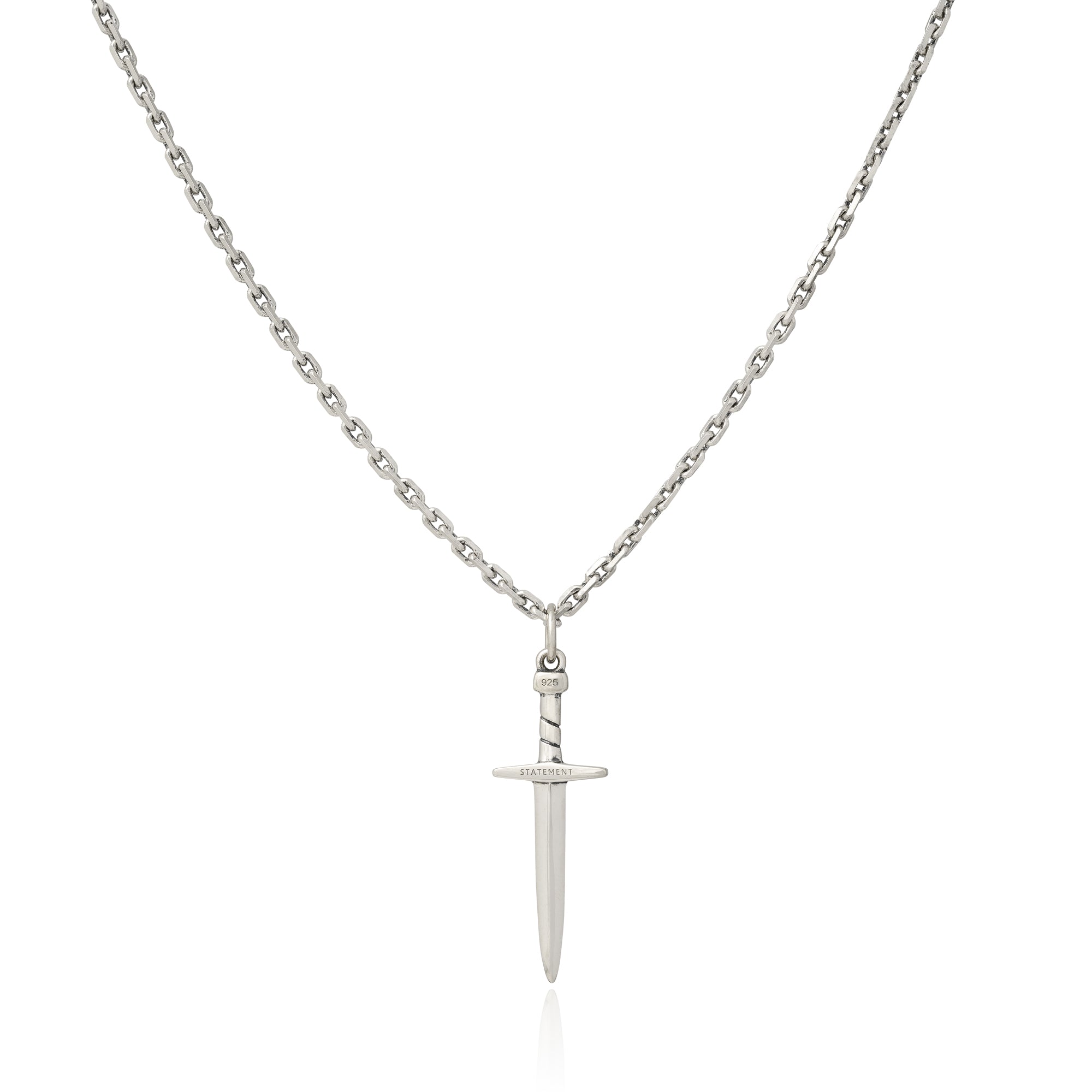 sterling silver dagger pendant hanging on chain against white background