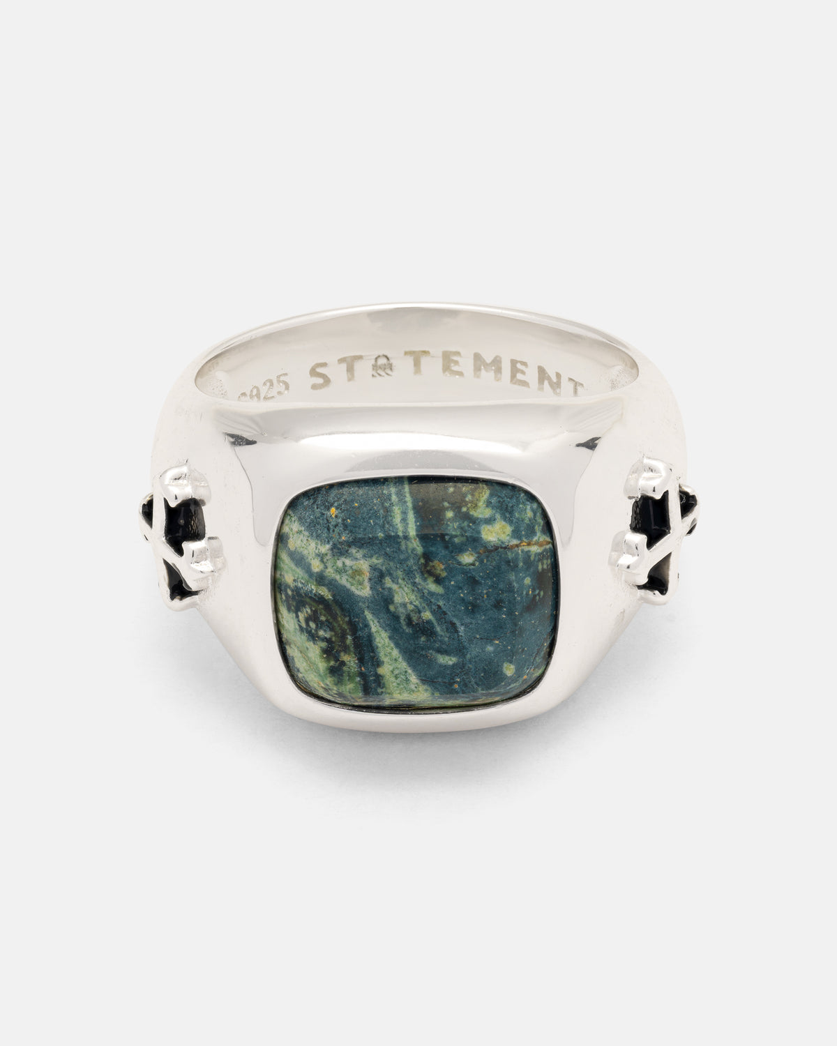 Statement Collective 925 Sterling Silver Kambaba Jasper Stone Ring featuring a rectangular, swirled green and black stone with tattoo-inspired cross-shaped side details.