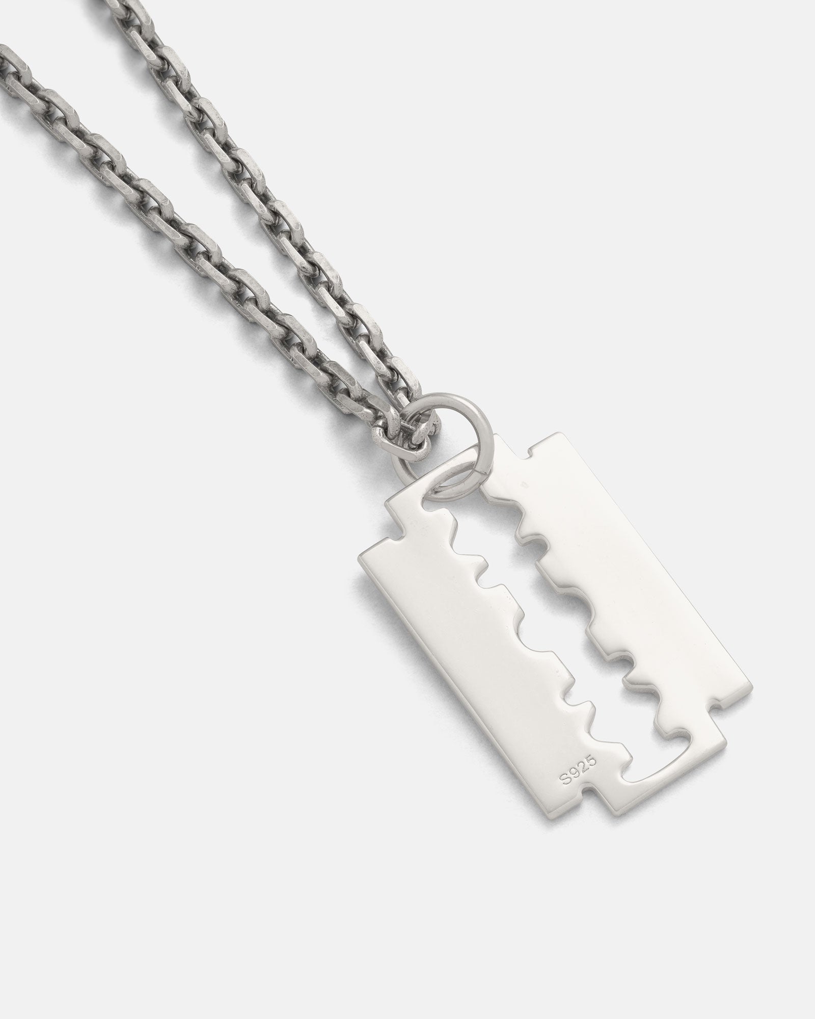 The 925 Sterling Silver Razor Blade Pendant, featuring an S925 engraving, is showcased against a plain white background.
