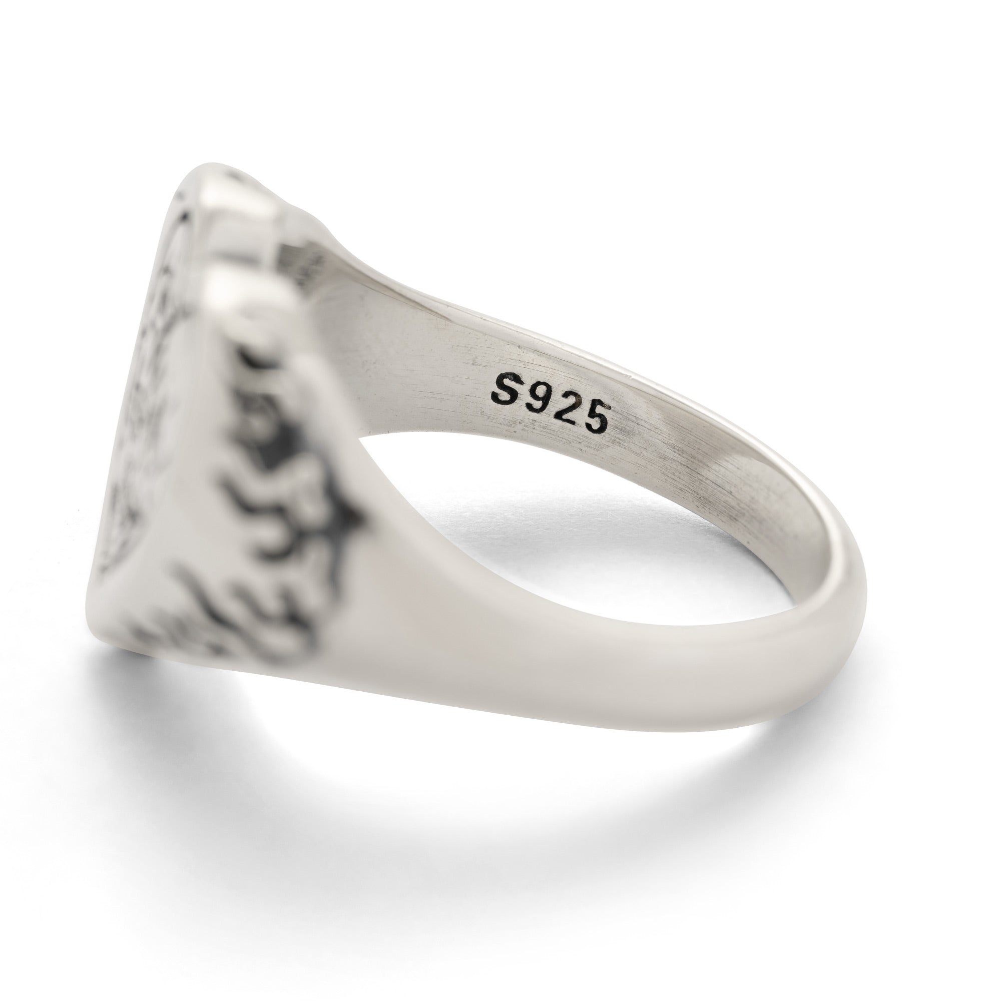 Sterling Silver ring with S825 hallmark engraved on a white background
