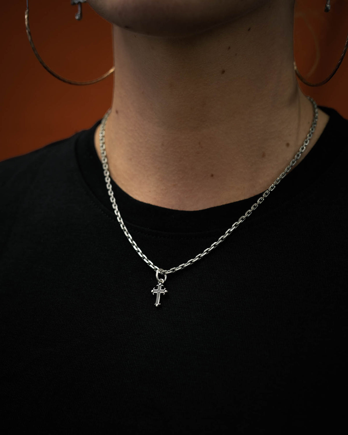 mini french cross pendant in sterling silver on womens neck