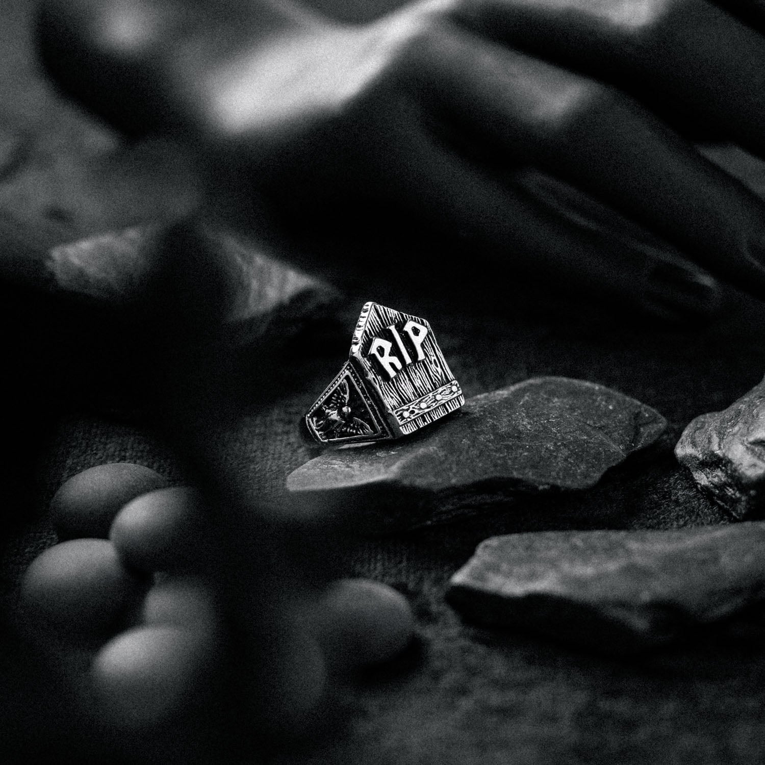 gravestone signet ring in black stone styled set by statement