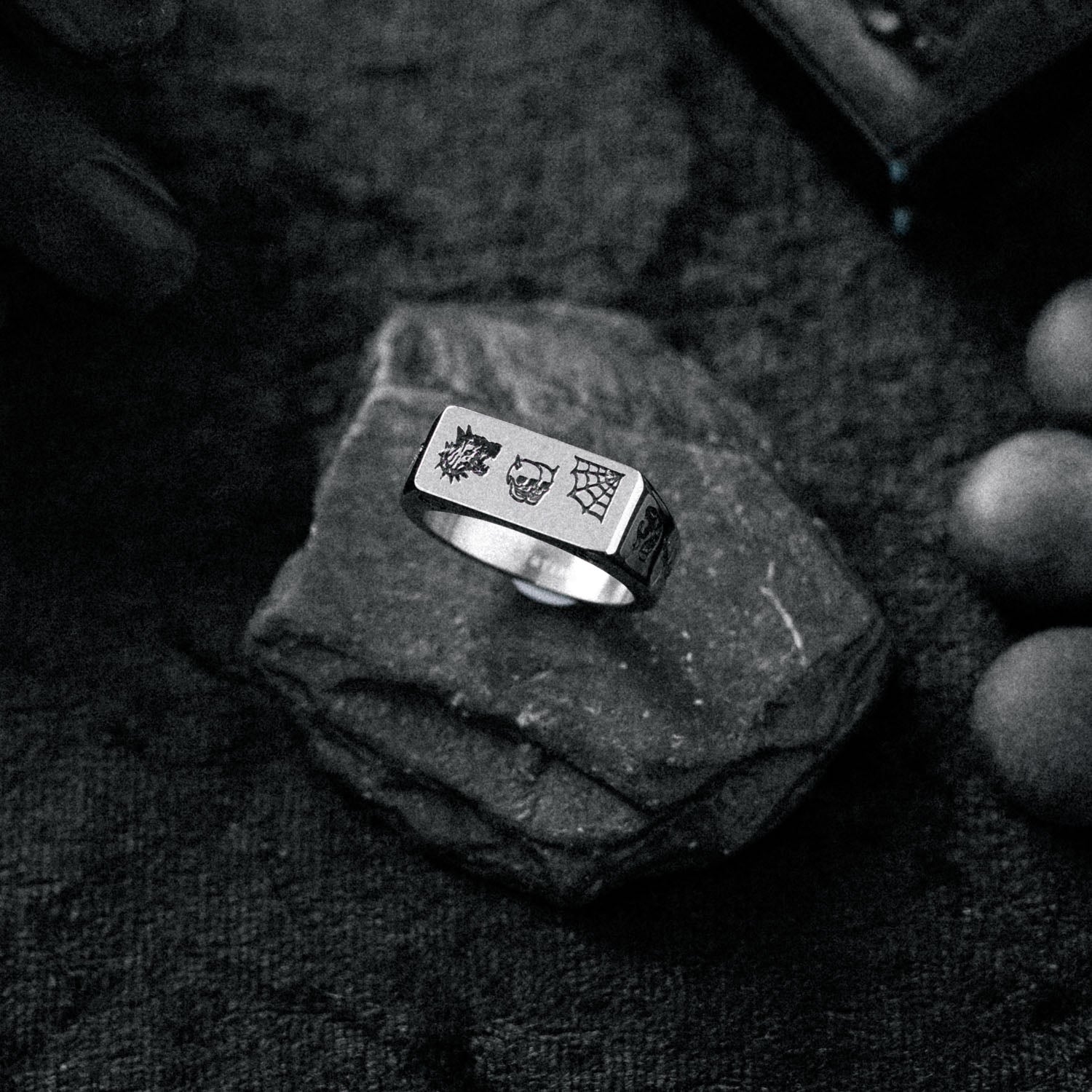 thin signet ring with flash tattoo engravings