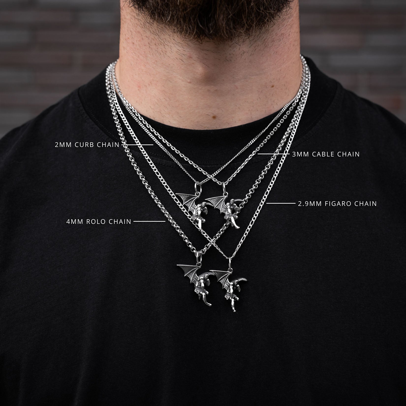 Man wearing multiple angel necklaces with chain types labeled against a brick wall background