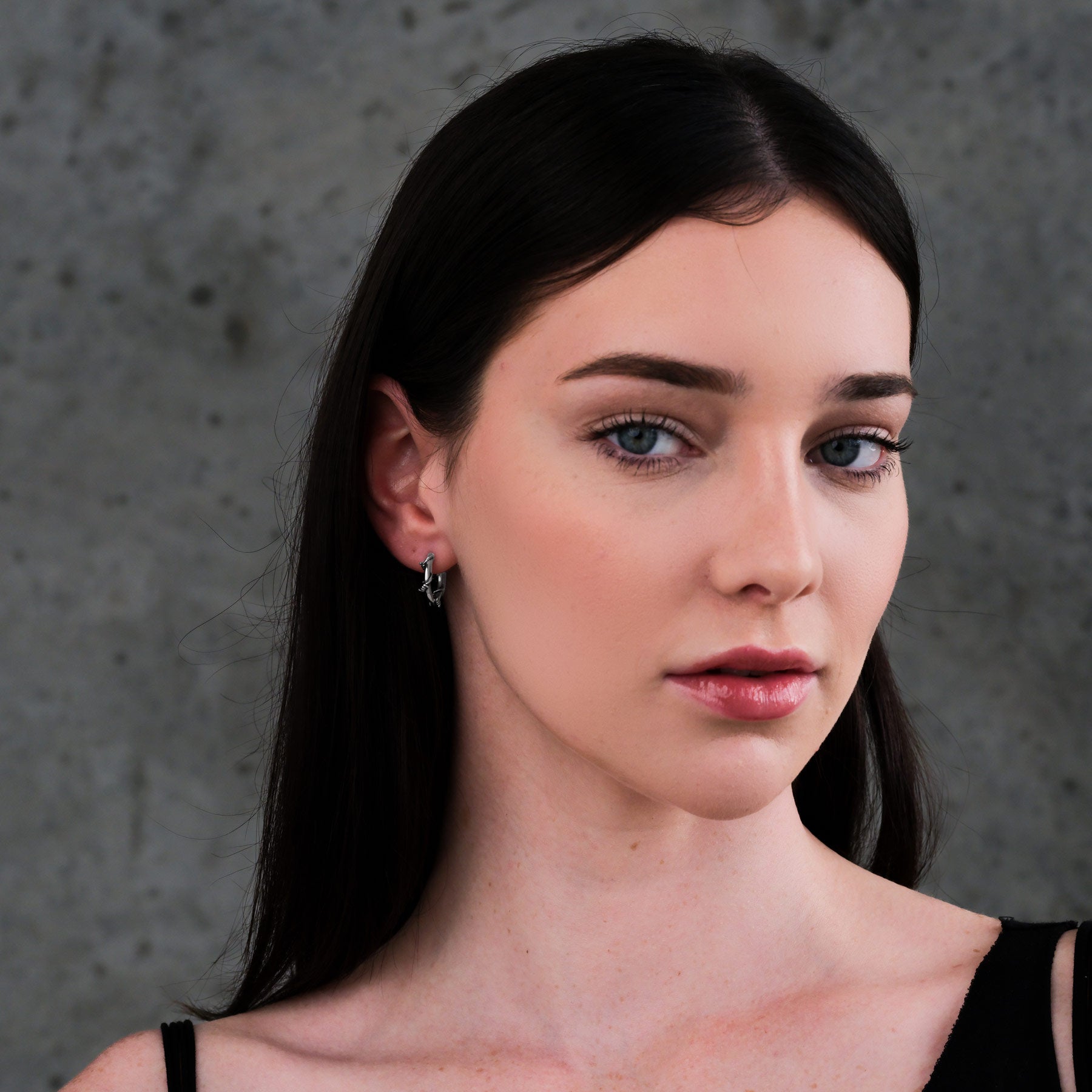 Barbed wire hoop earrings on women for gothic