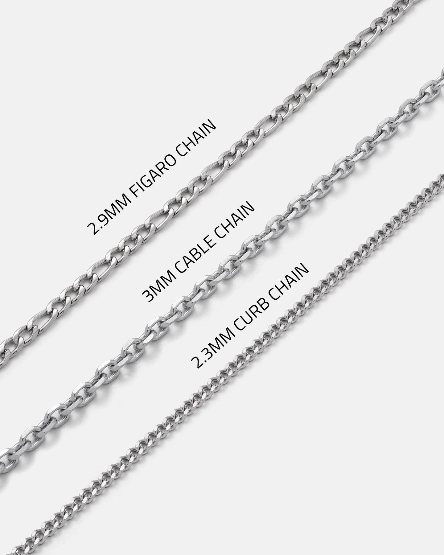 Three silver chains are displayed diagonally on a white background, labeled as 2.9mm Figaro Chain, 3mm Cable Chain, and 2.3mm Curb Chain, each showcasing unique link styles and thicknesses—providing versatile options for pairing with the STATEMENT “Big Iron” Pendant.
