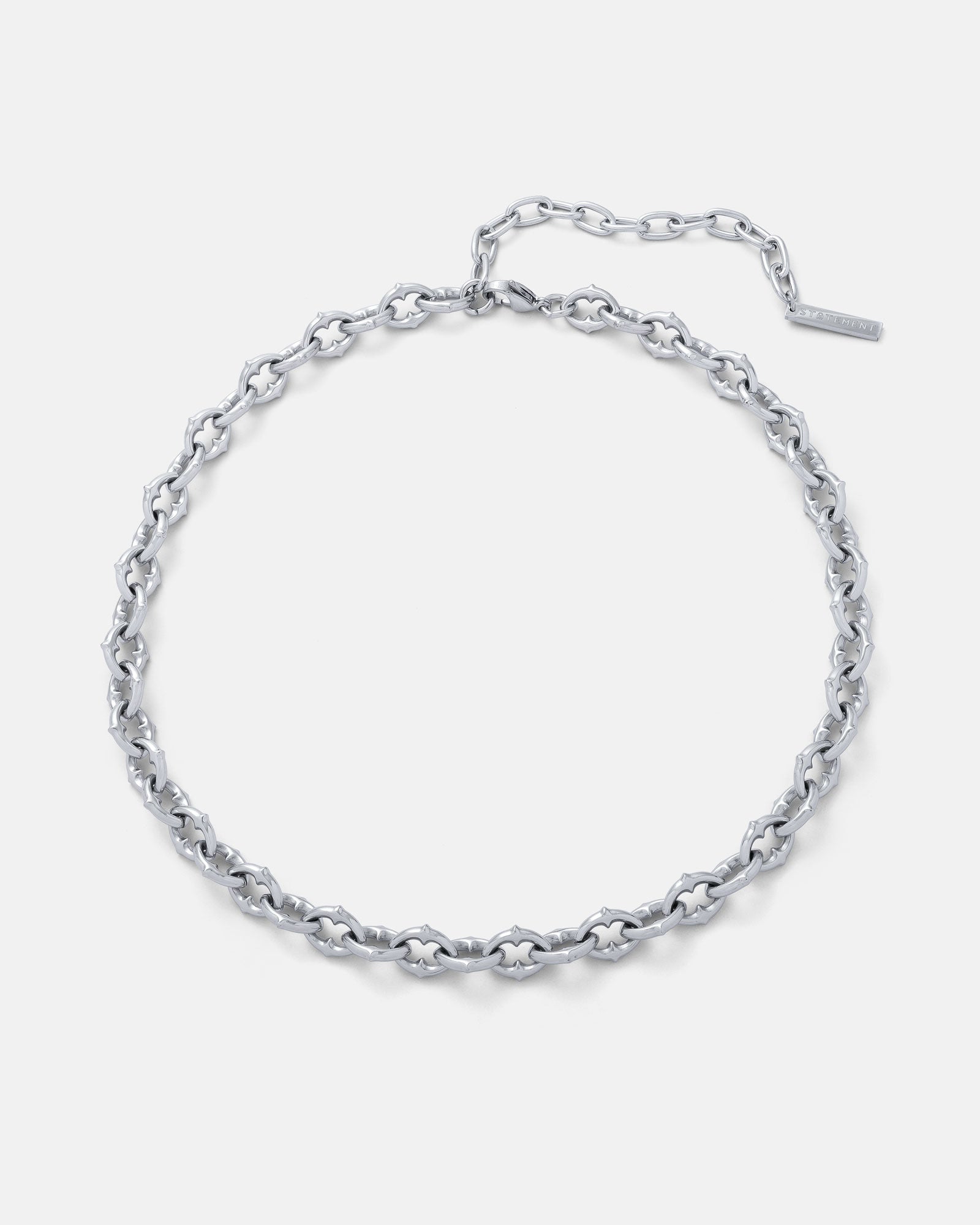 medieval spiked necklace chain in silver on grey background