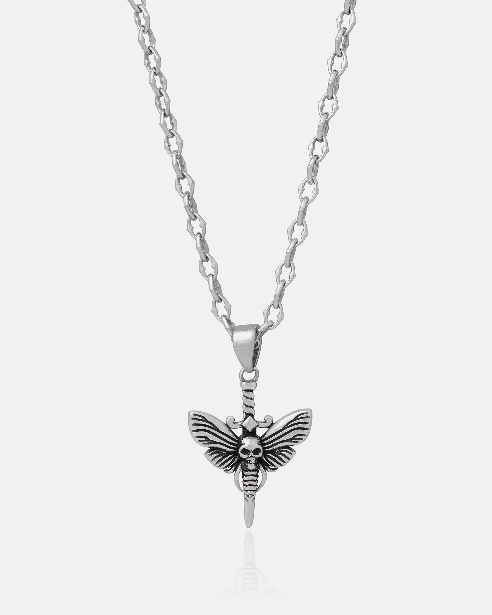 The Cathedral" 6mm Spiked Chain necklace, shown on a plain white background, features a custom pendant depicting a sword, an outstretched moth, and a central skull in medieval silver style.