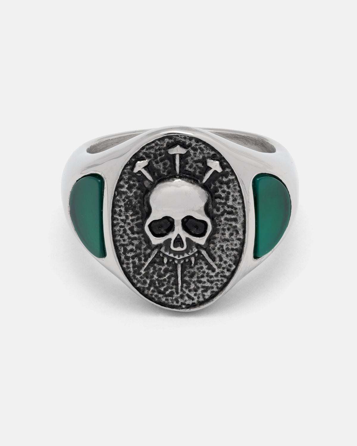 SARA_S X STATEMENT Condemned Signet Ring featuring an oval face with a skull embossed above three nails, flanked by inlaid green stones on each side.