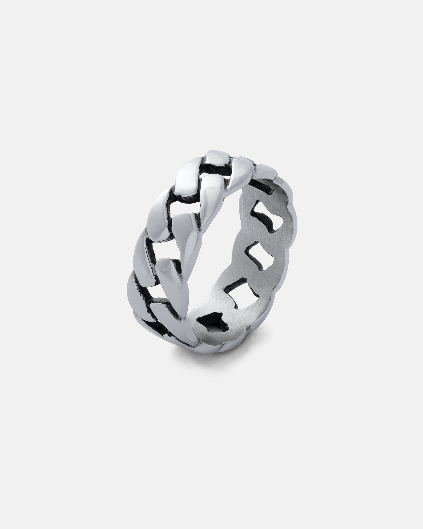 The Cuban Link Ring, made of stainless steel and featuring an interwoven design, is shown upright on a plain light gray background.