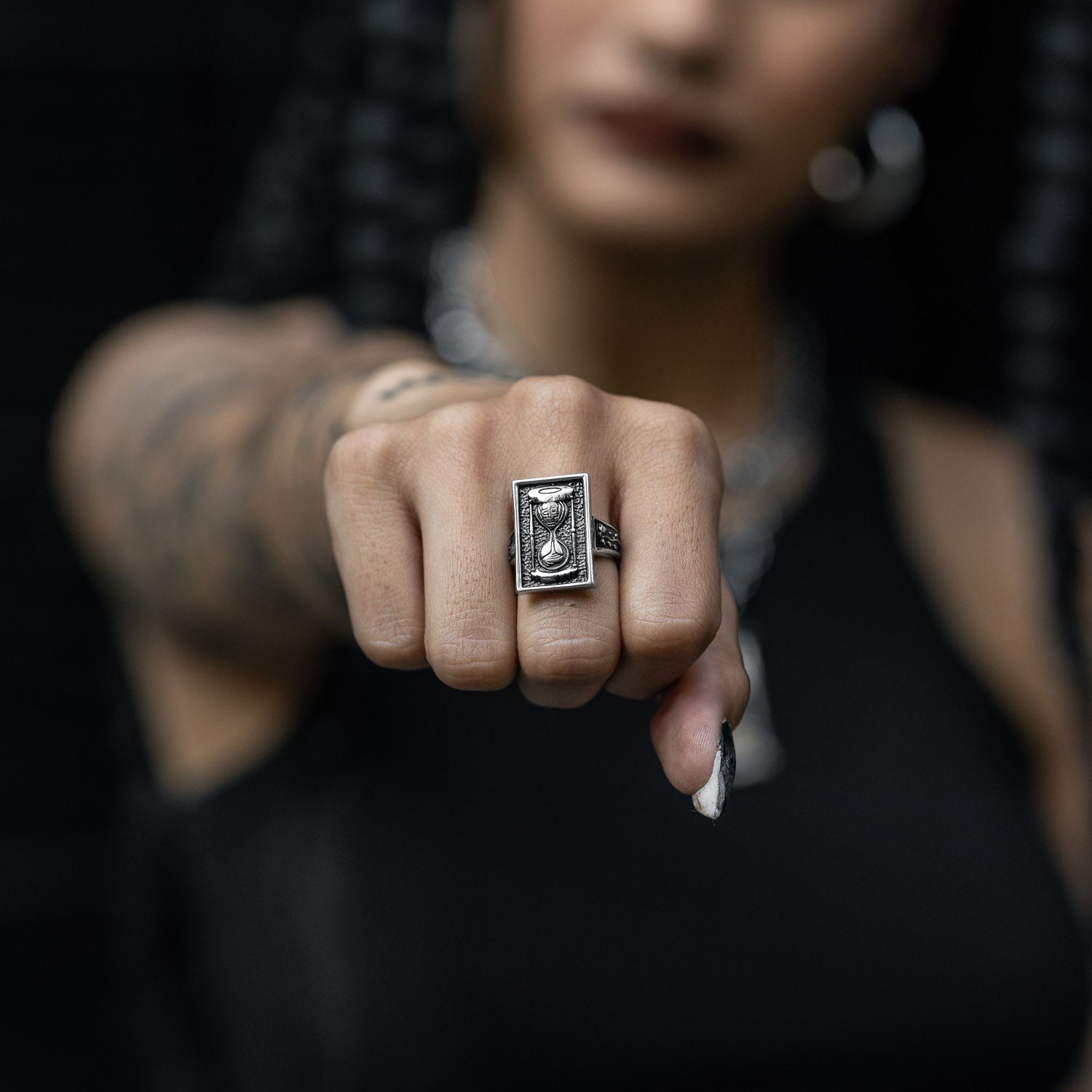 hourglass ring with skull by statement collective