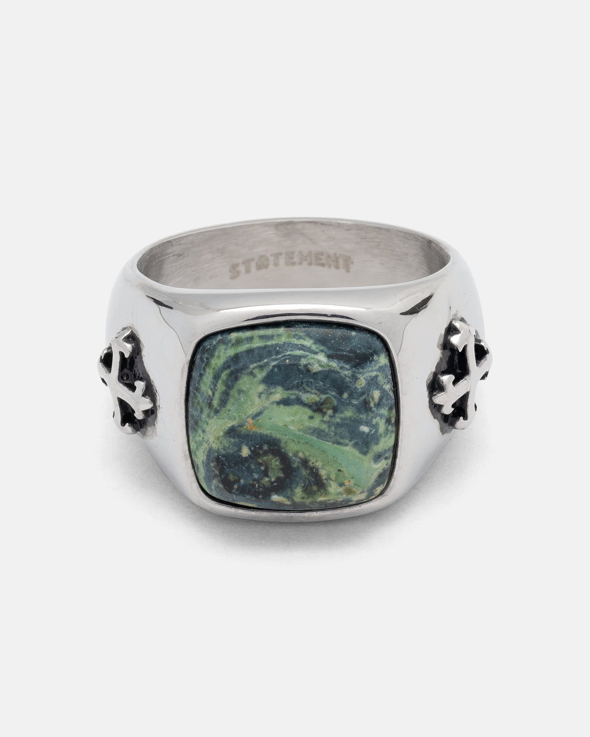 Kambaba Jasper Stone Ring featuring a rectangular green and black stone set in a silver band with cross-shaped details on the sides.