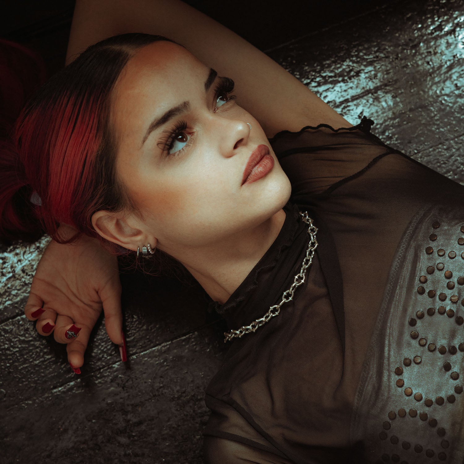 9mm spiked chain in sterling silver on female model laying down