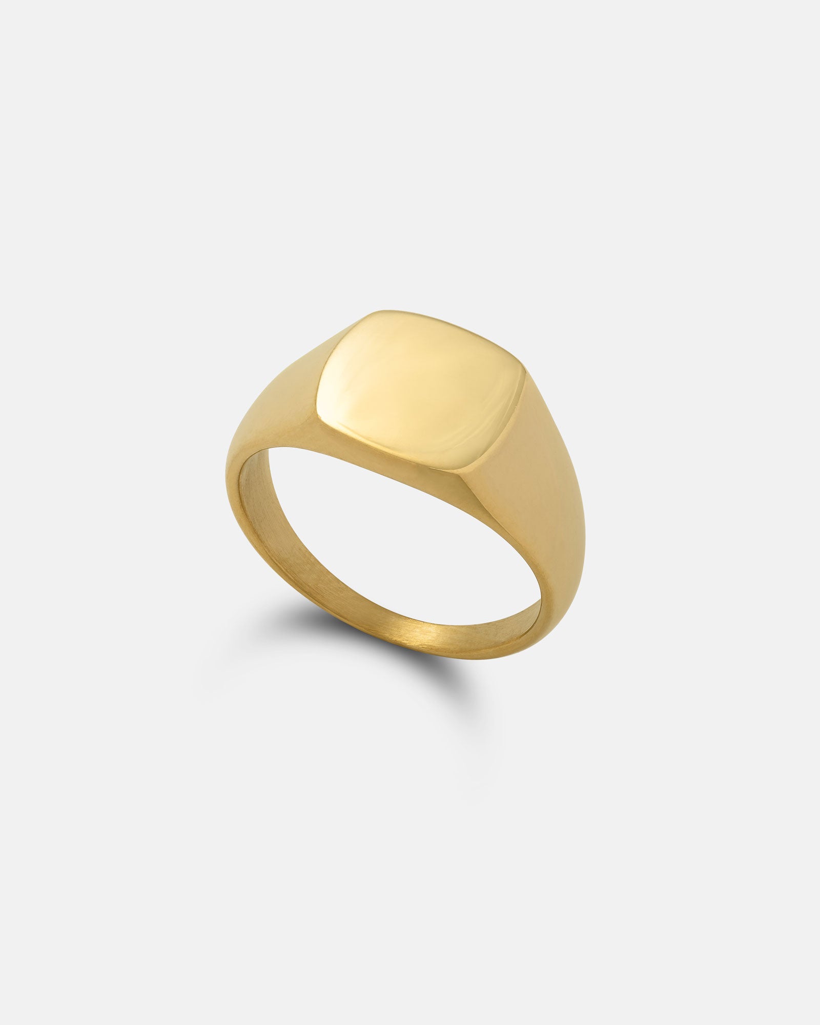 The Minimal Signet Ring (Gold) features a smooth, flat, square-shaped top in 18k gold, presented on a plain light gray background.