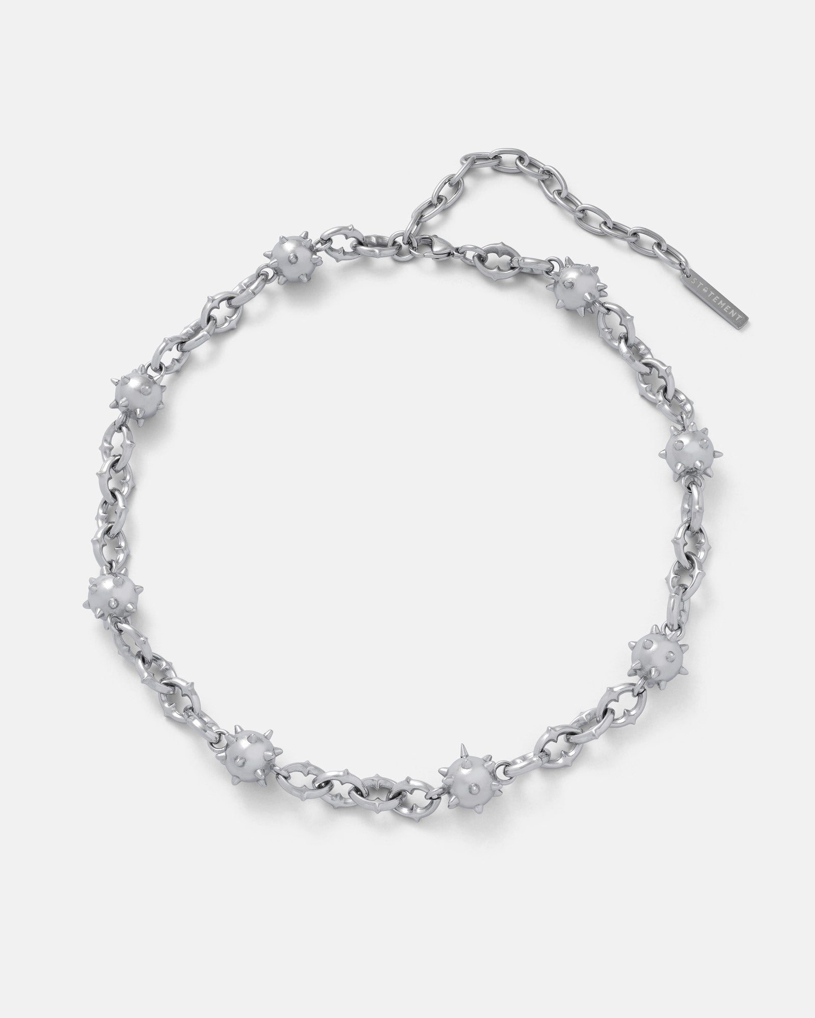 The "Morning Star" Cathedral Chain is a stainless steel necklace with evenly spaced spiked beads resembling medieval maces, creating a striking weapon-inspired look on a plain white background.