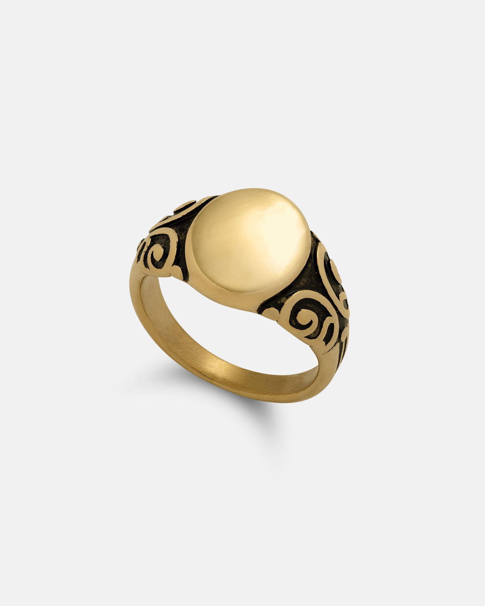 The Mini Oval Scroll Signet Ring (Gold), made from 18k gold with a smooth oval face and blackened scroll details on the band, is shown against a plain light background.