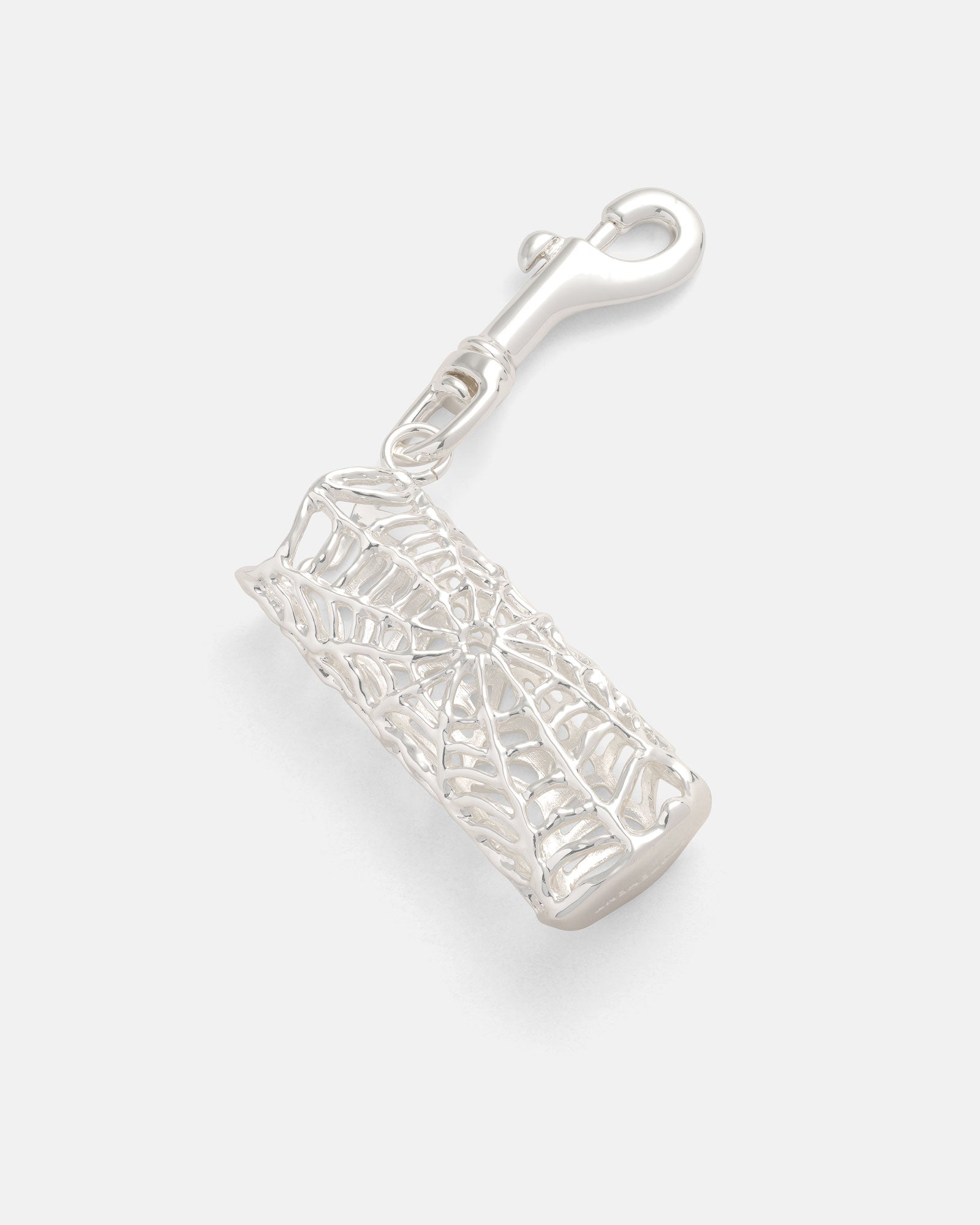 A Spiderweb Lighter Sleeve by Statement Collective, featuring a silver spiderweb design with a lobster clasp, displayed on a plain white background.