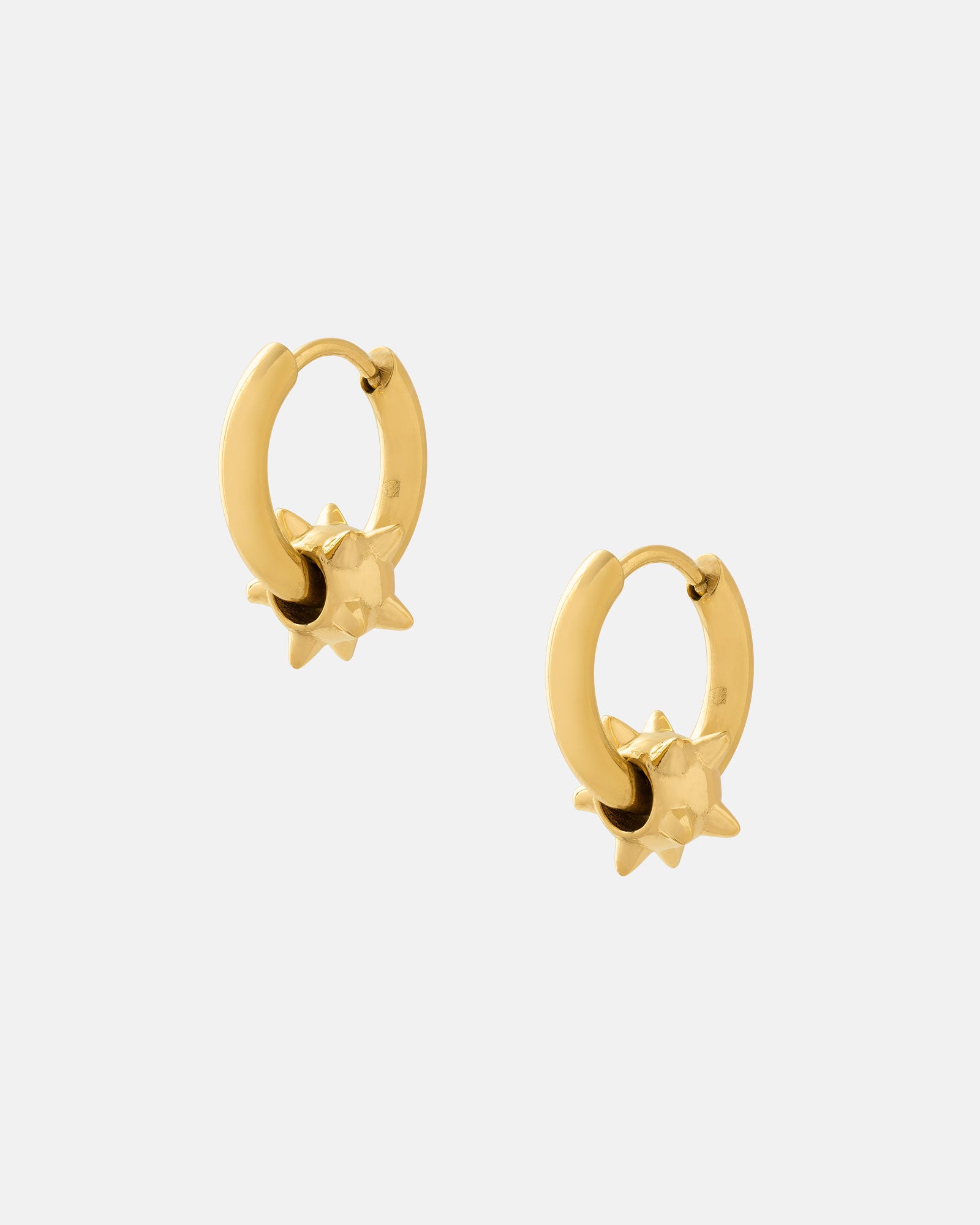 The "Morning Star" Earrings (Gold) are small 18k gold-plated hoops with spiked star-shaped charms, shown on a plain light gray background.