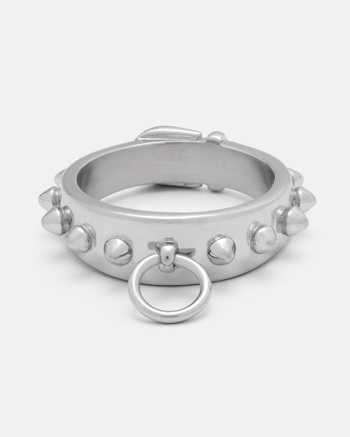 A spiked dog collar ring from Statement Collective, featuring a silver metal bracelet with spike studs encircling the band and a bold circular spiked ring attached at the front.