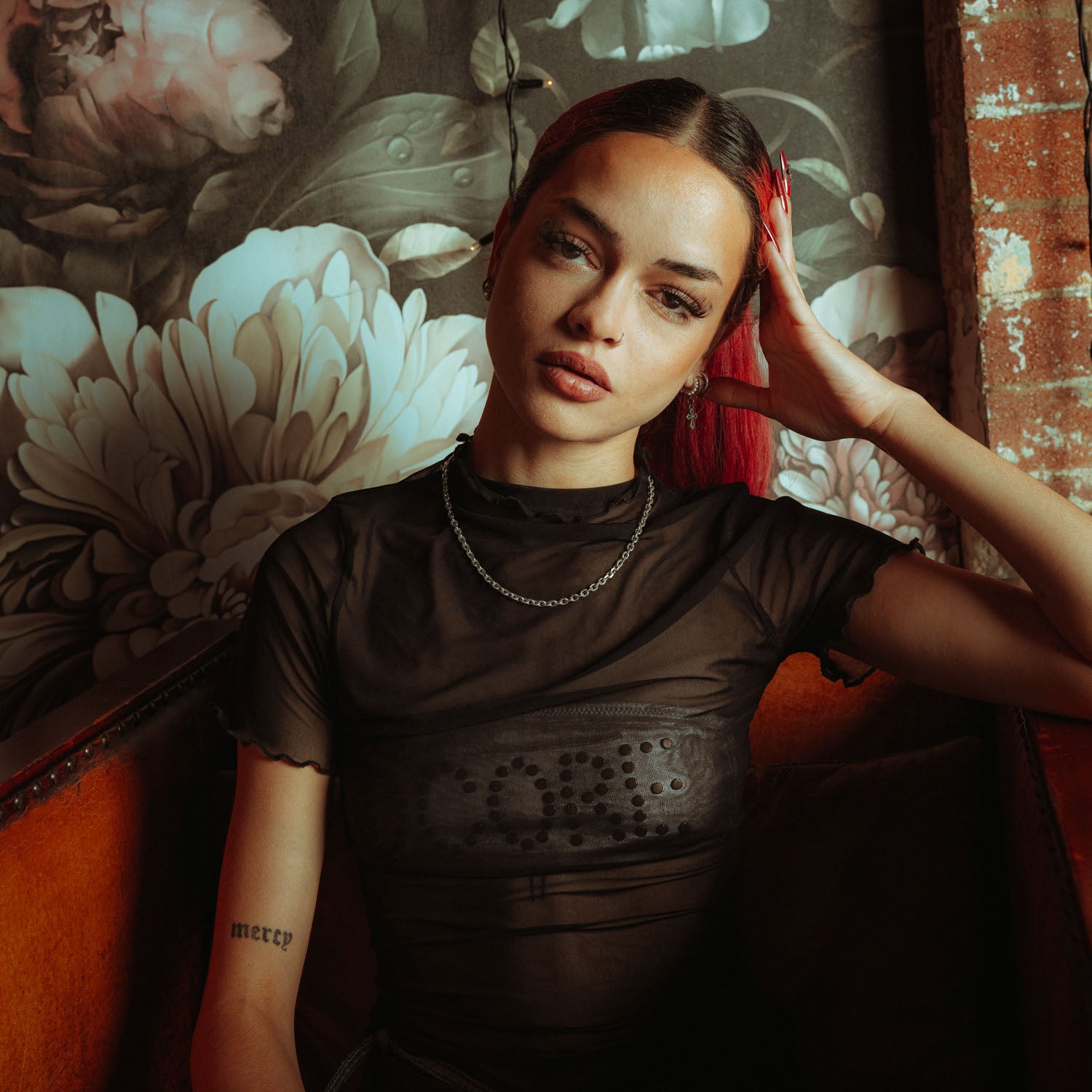 4.5mm cable chain in sterling silver on female model with mesh shirt