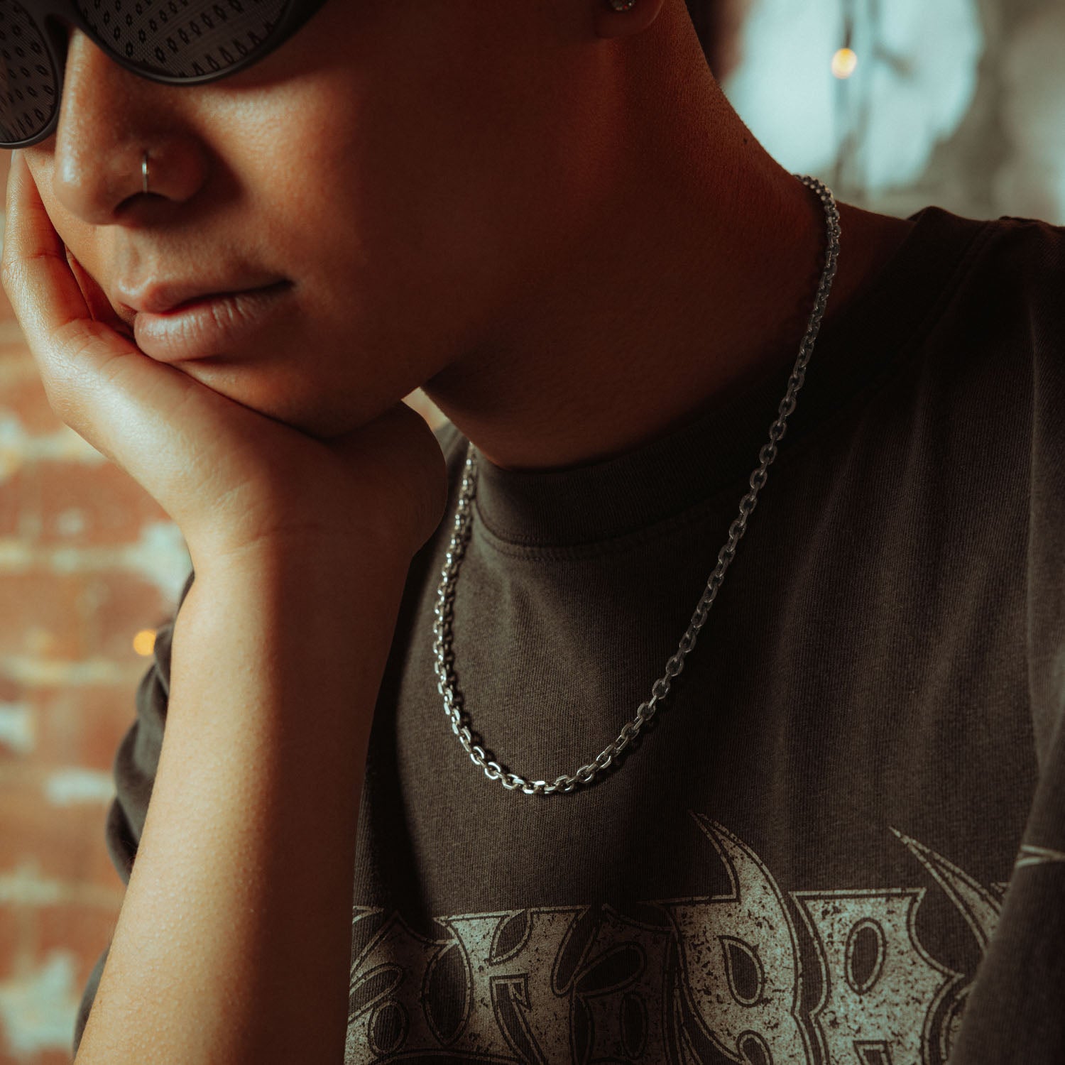 4.5mm cable chain in sterling silver on male model with grey shirt