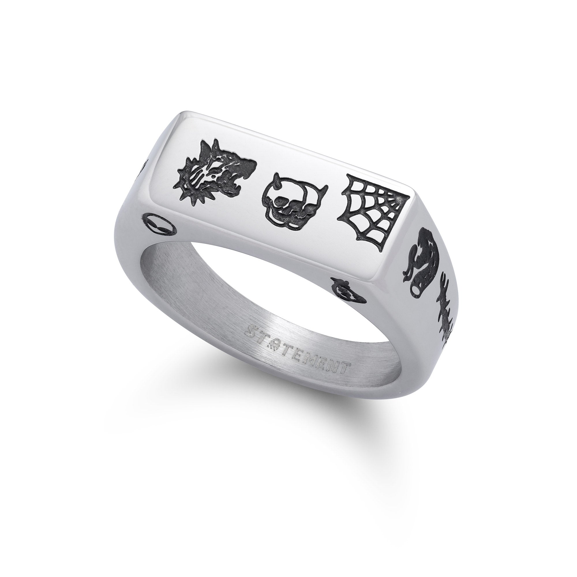 Silver signet ring, rectangular shaped with traditional style tattoo details including skulls, snakes, spider webs, barbed wire and more.
