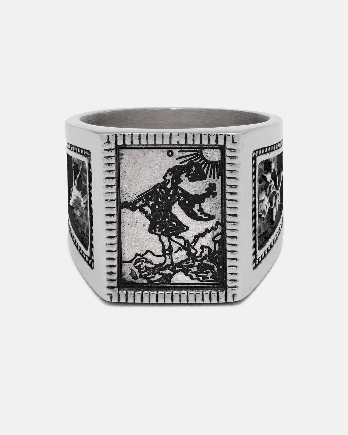 Statement Collective Try Hard Fool stainless steel signet ring featuring an engraved rectangular tarot card design of a figure carrying a staff under a sun.