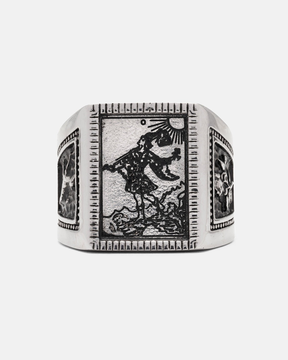 Statement Collective Try Hard Fool signet ring in silver, featuring an engraved image of a figure walking with a bindle under a sun.