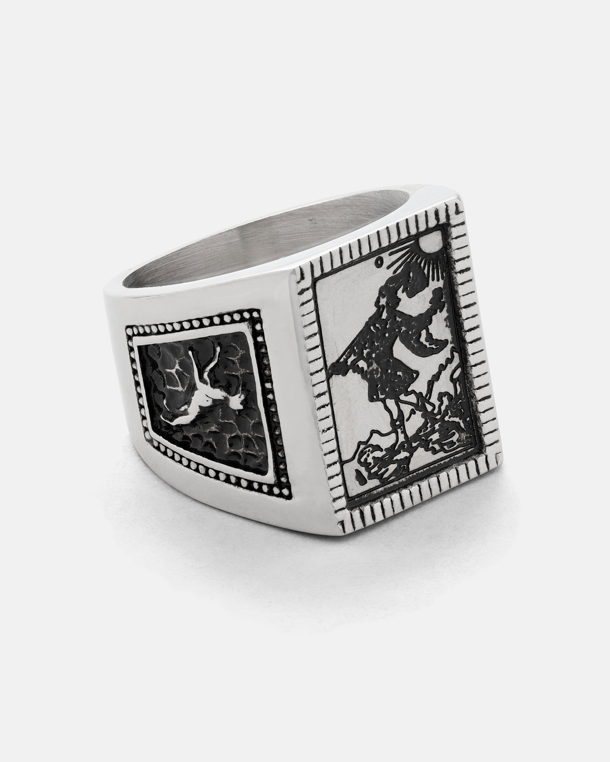 Silver Try Hard Fool ring by Statement Collective featuring an engraving of the tarot card on the face and a falling figure on the side.