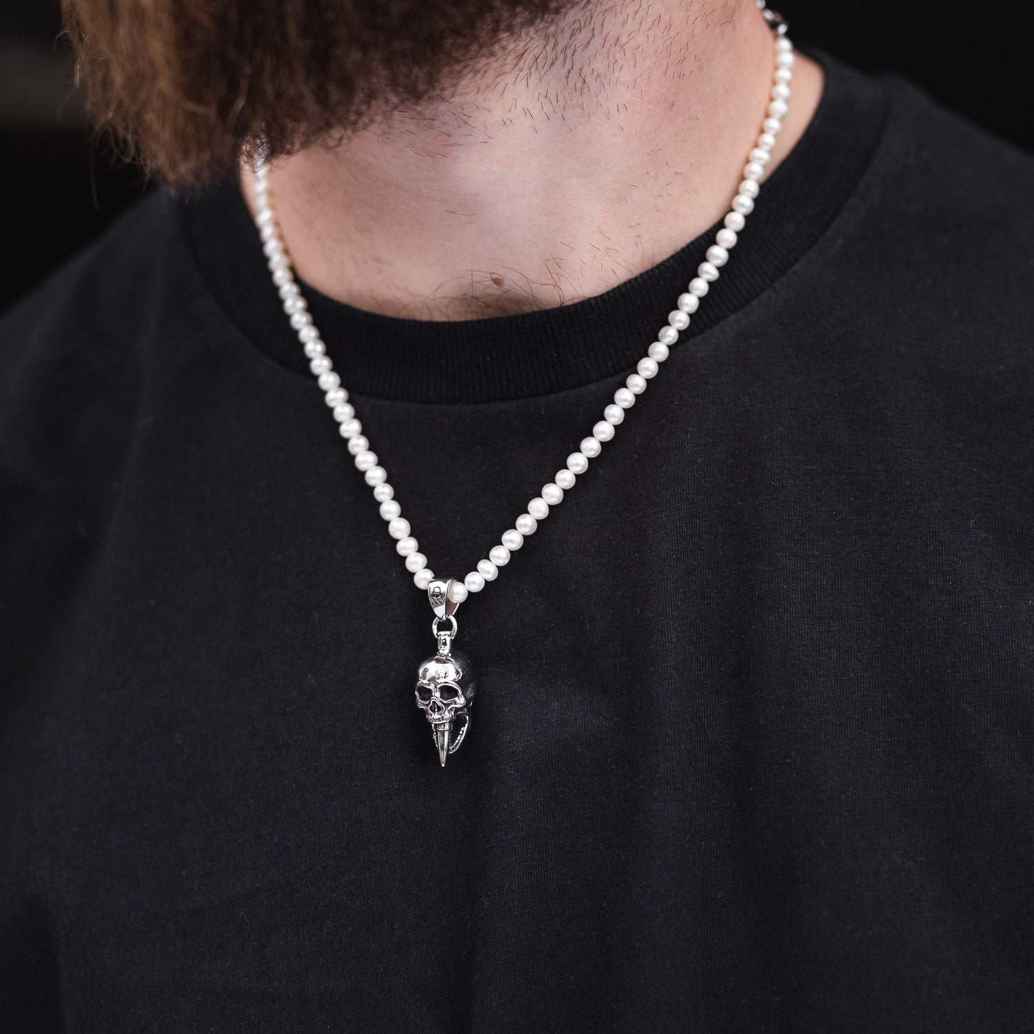 skull pendant on pearl necklace mens