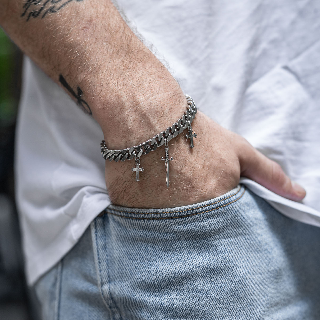 mens bracelet with dagger charm and crosses by statement collective