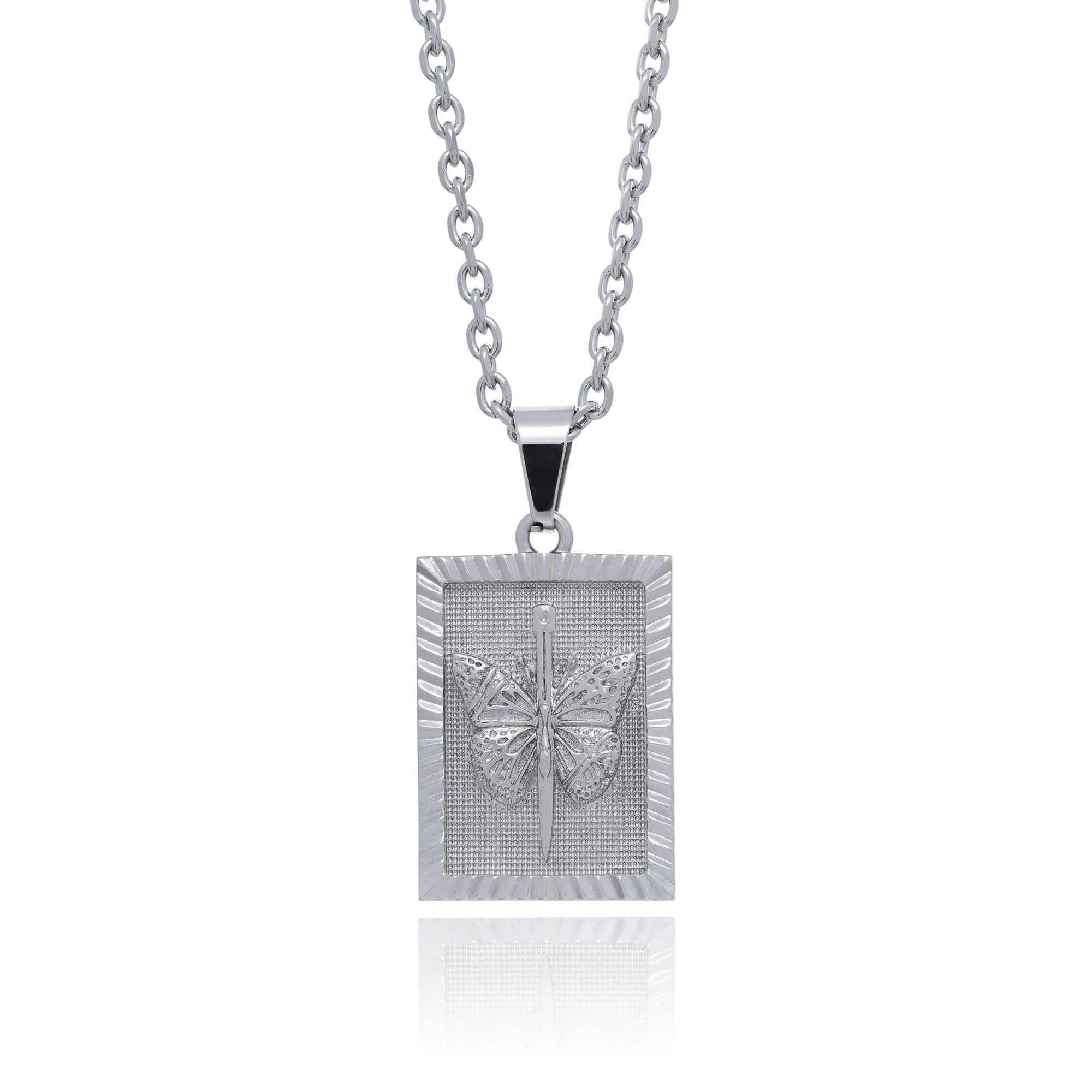 silver butterfly necklace pendant on chain against white background by statement collective