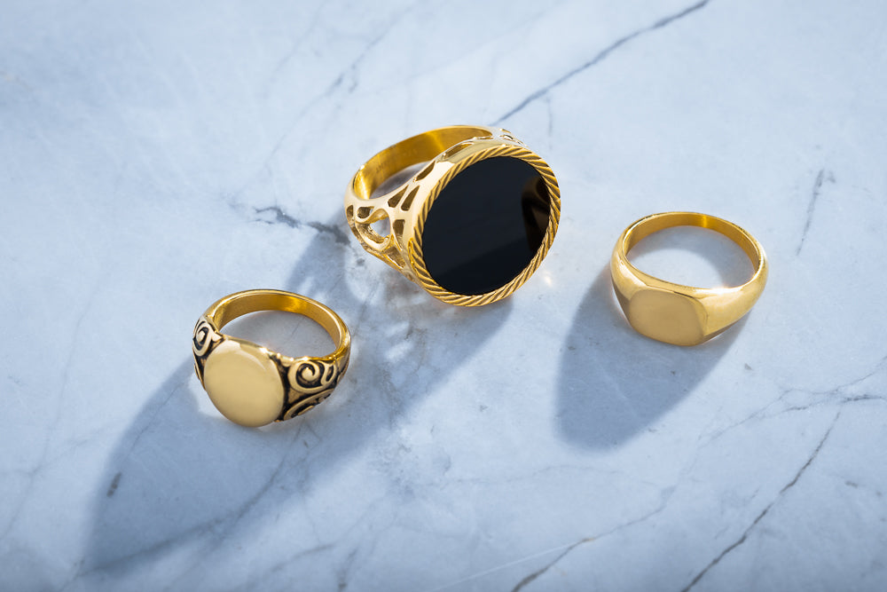 Gold Rings On Marble Bench