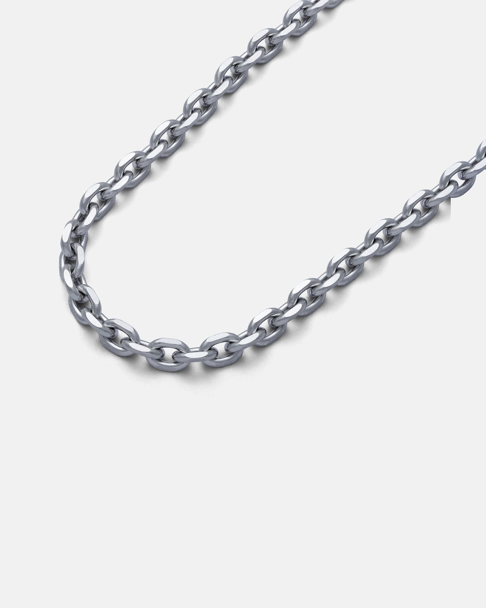 A close-up view of the 4.5mm Cable Chain necklace, crafted from stainless steel with oval beveled links and diamond-cut edges, displayed on a plain white background.