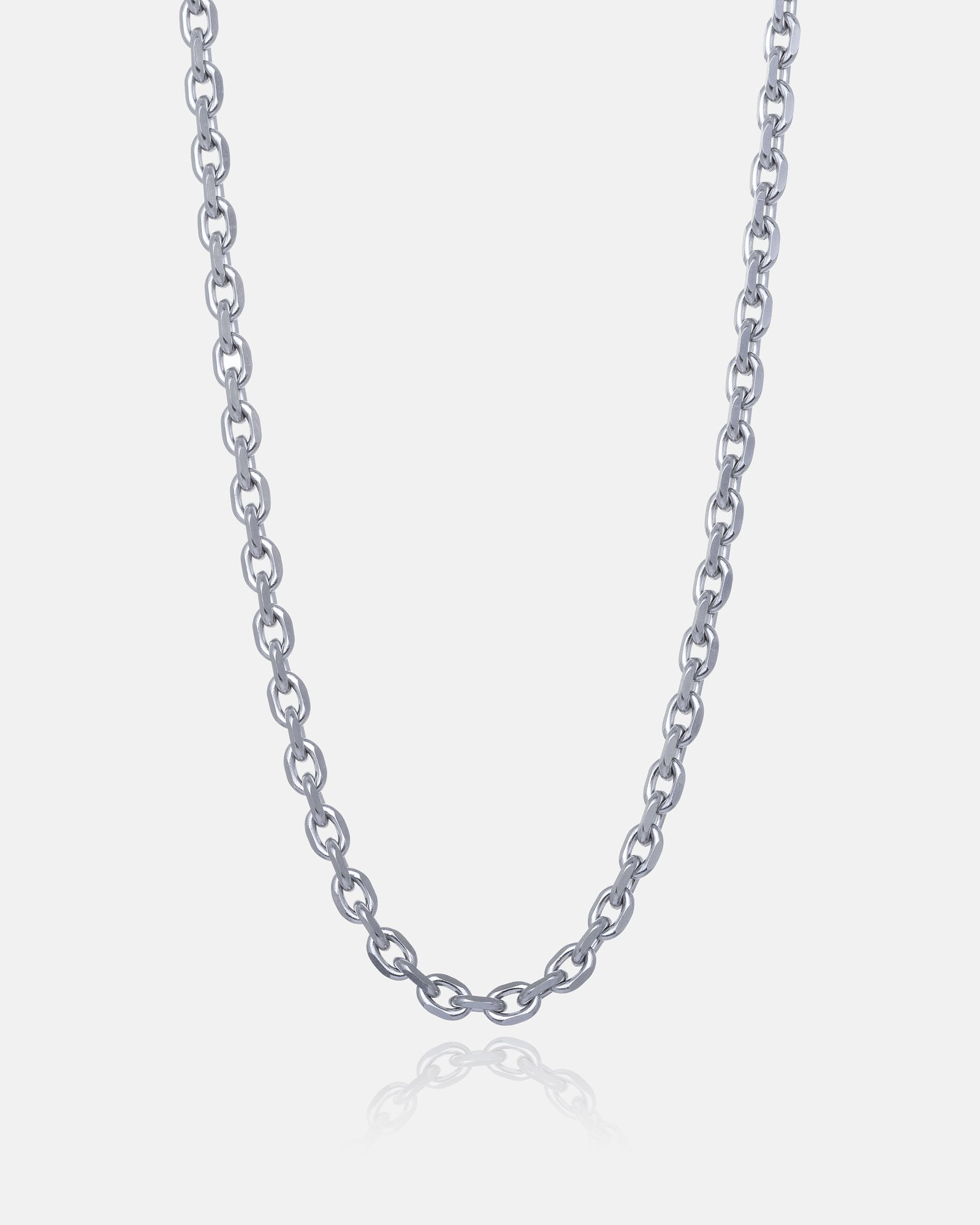 The 4.5mm Cable Chain, a stainless steel necklace with oval links and diamond-cut edges, is displayed on a plain white background. The beveled chain is centered, forming a gentle curve at the bottom.