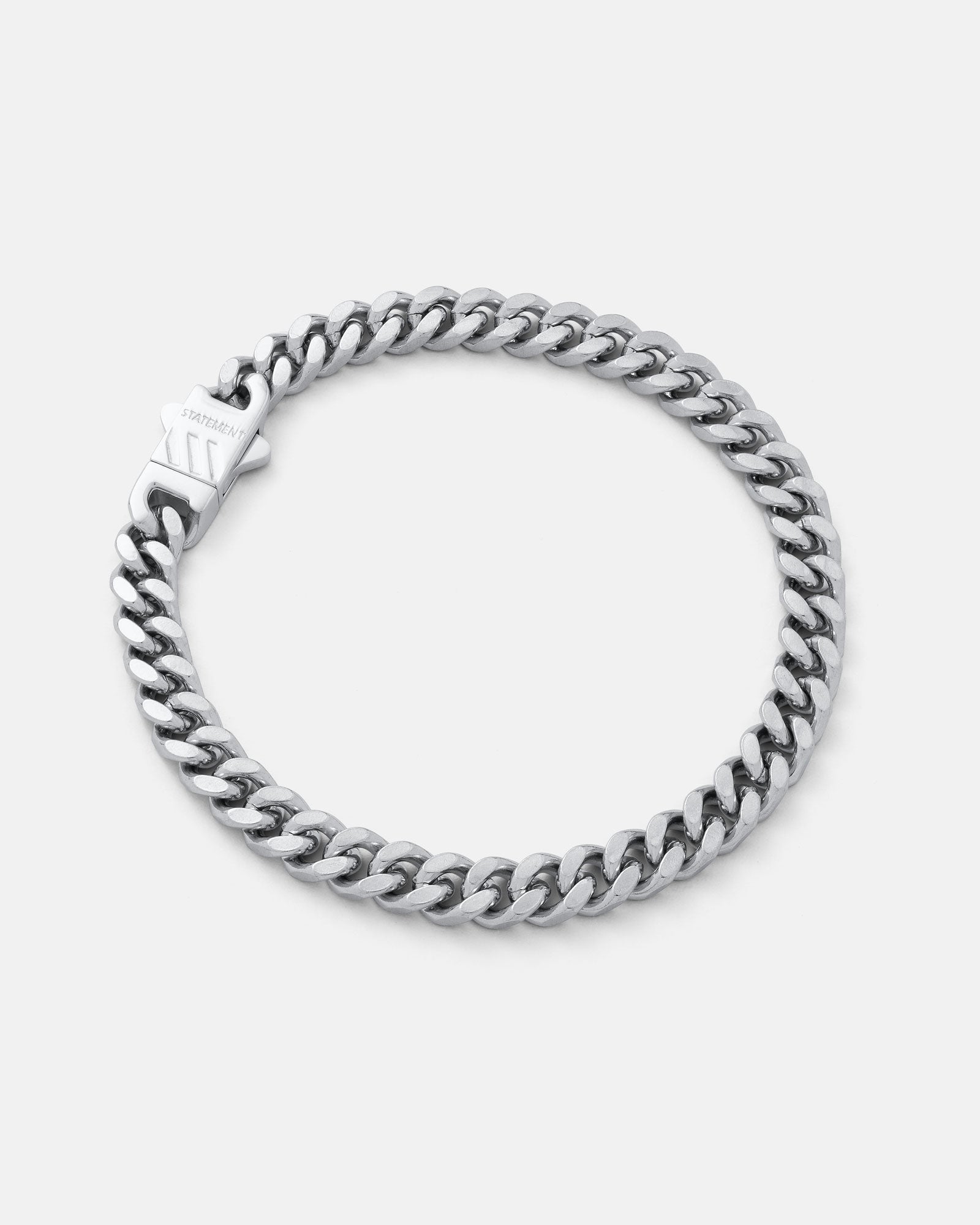 6mm thin cuban link bracelet in silver by statement collective on grey background