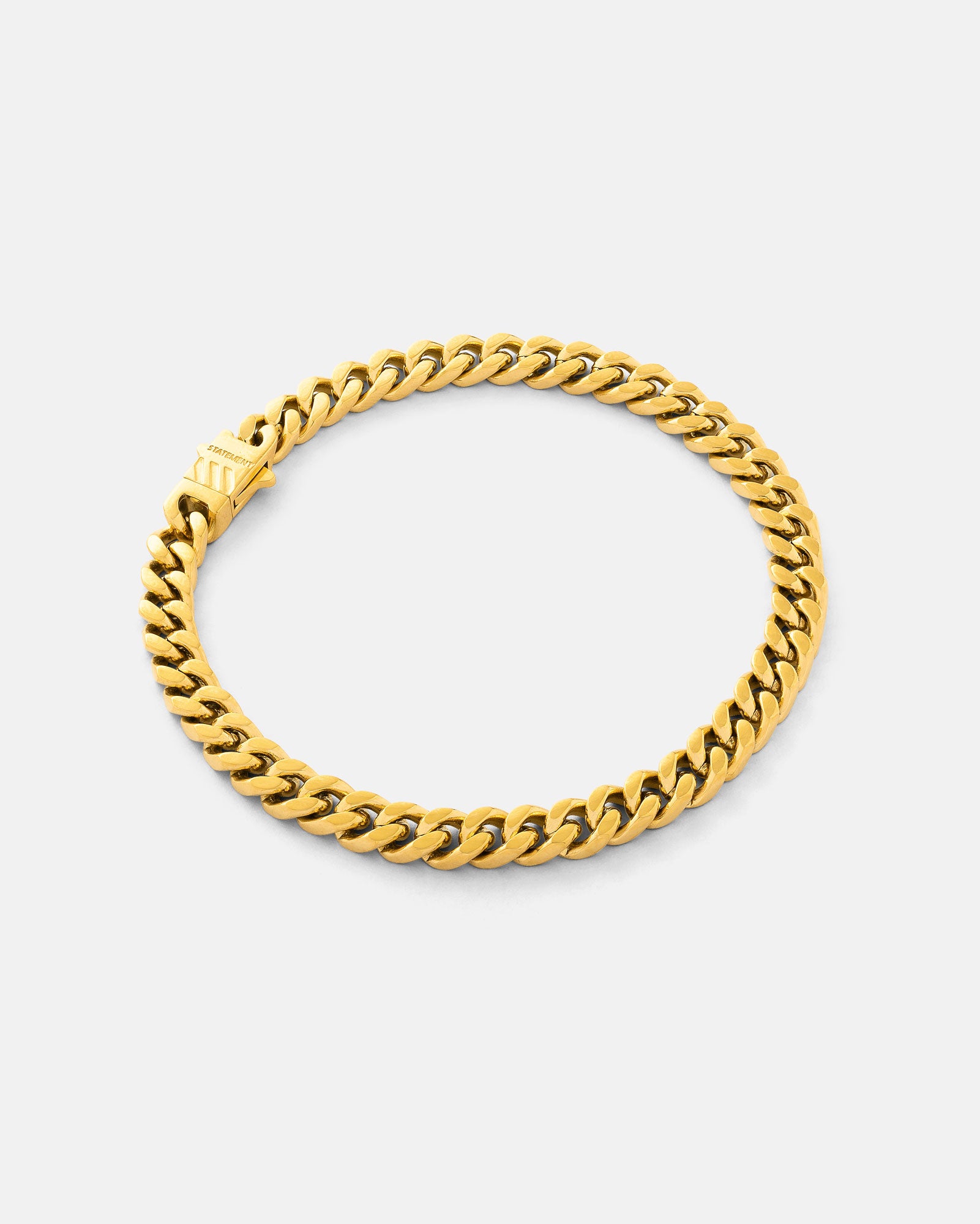 Gold 6mm Cuban Bracelet by Statement Collective on Grey background