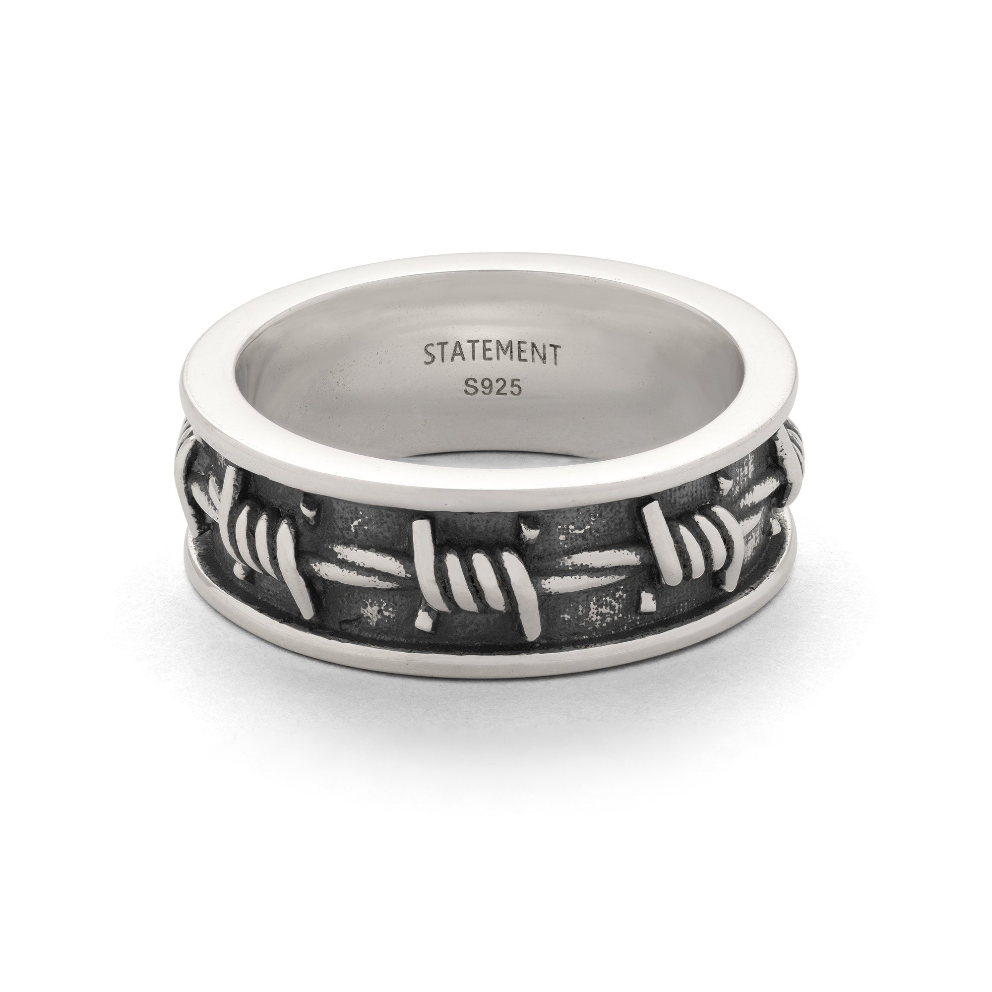 925 sterling silver band ring with barbed wire pattern on white background