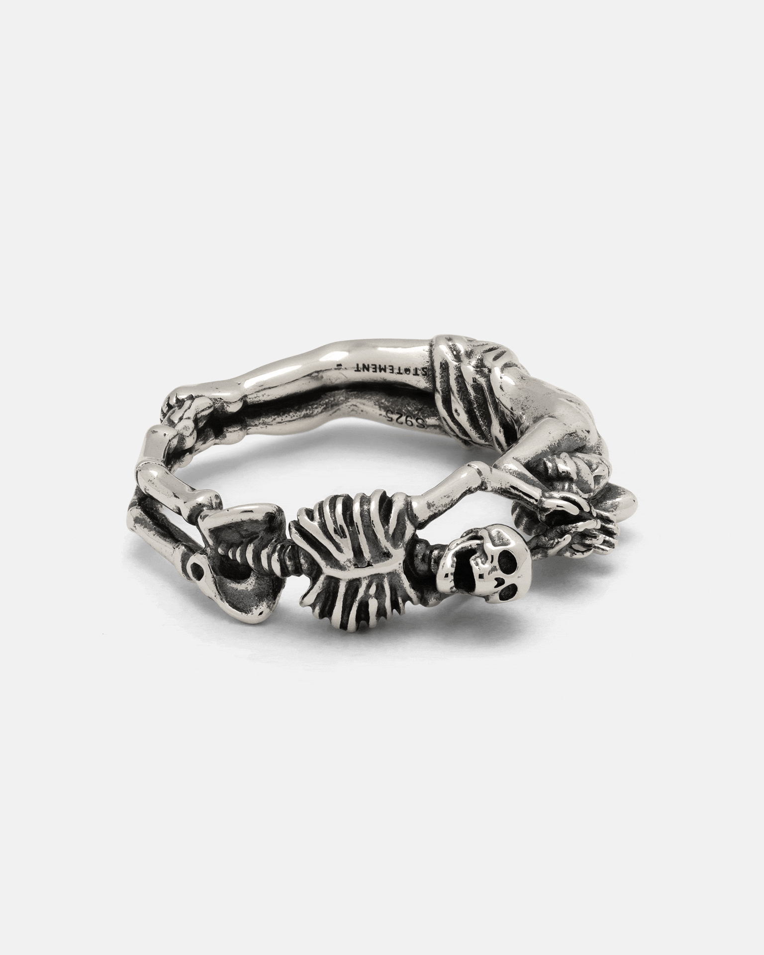 925 Sterling Silver Breaking Wheel Ring shaped like a gothic, macabre skeleton curled into a circle.