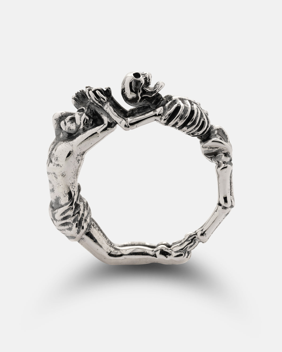 A 925 Sterling Silver Breaking Wheel Ring featuring a human figure and a skeleton joined in a continuous circular loop.