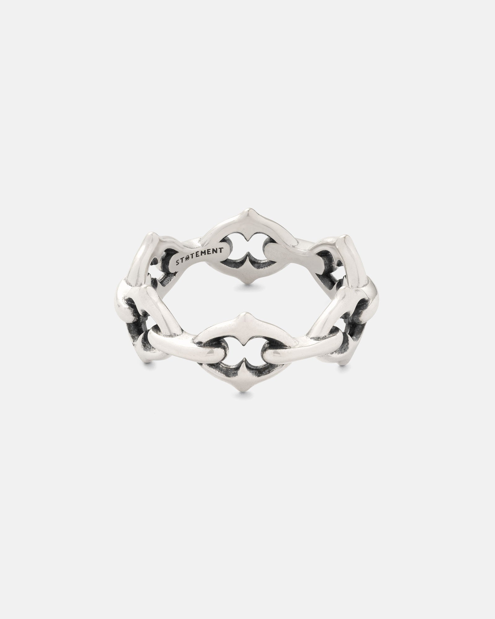 The 925 Sterling Silver "The Cathedral" Spiked Ring features an intricate openwork gothic pattern with black accents and ornate design, plus the word STATEMENT engraved inside the band.