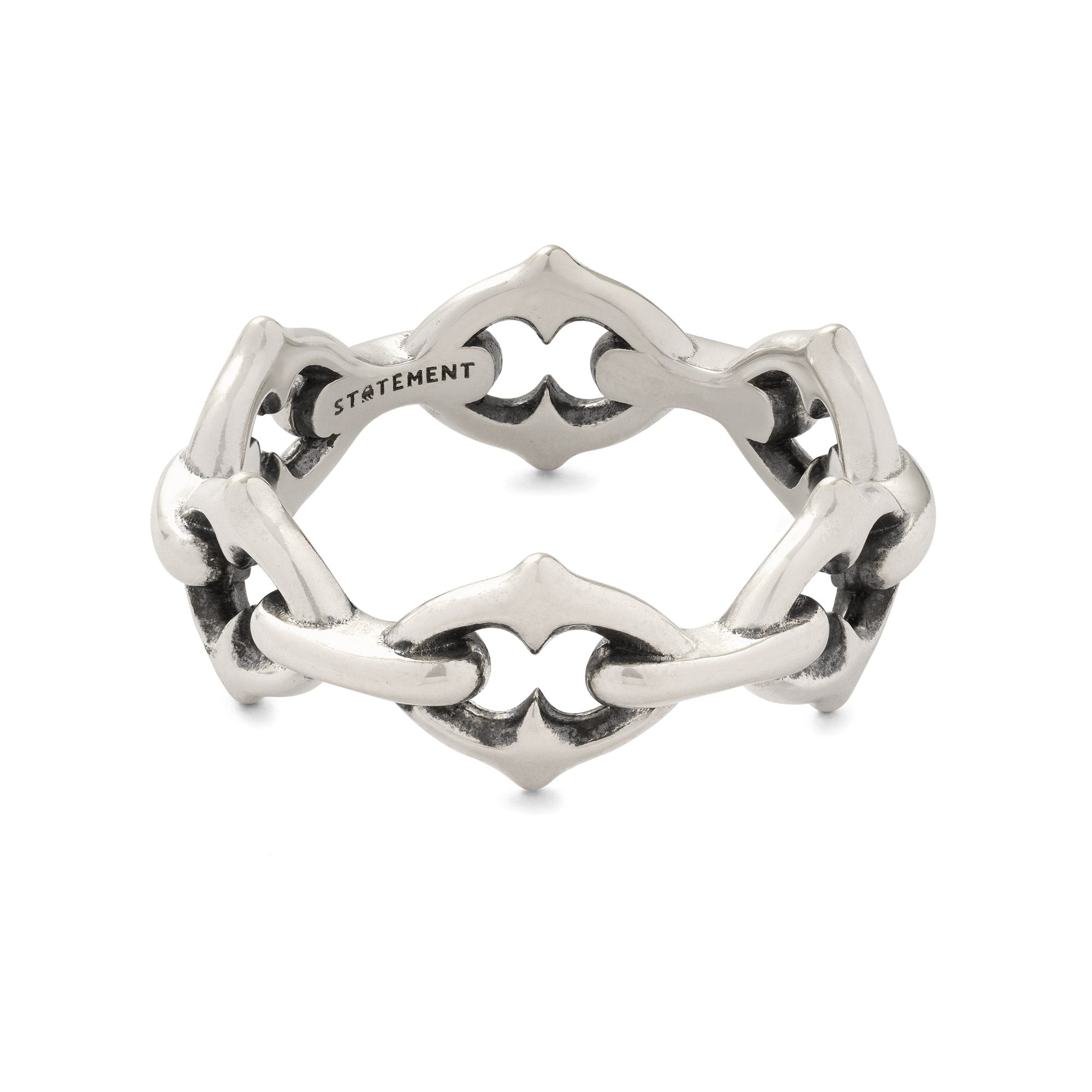 Sterling silver ring with spiked cable links on white background 