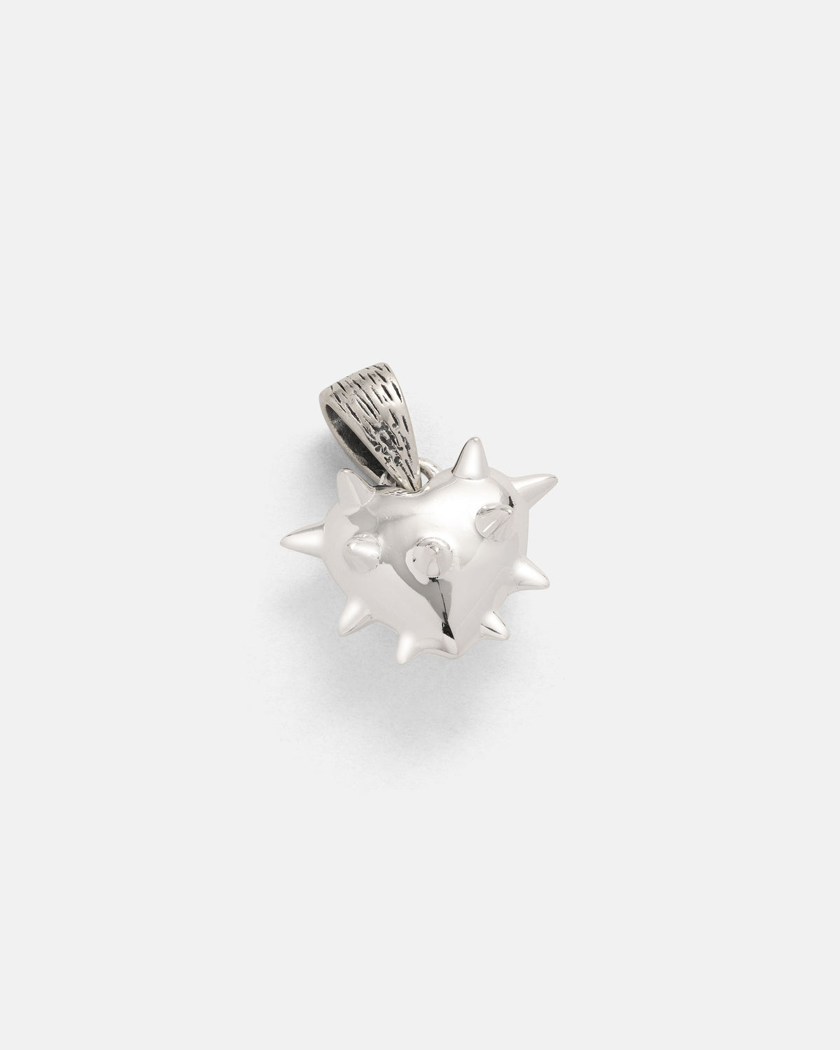 Make a bold statement with the Statement Collective 925 Sterling Silver Mini "Love Hurts" Pendant. Featuring a striking spiked ball design reminiscent of a mace or sea mine, this edgy pendant is complete with a textured bail for secure attachment to your favorite necklace. Perfect for fans of rock-inspired jewelry, it stands out brilliantly against any plain, light-colored background, making it an unforgettable addition to any sterling silver collection.