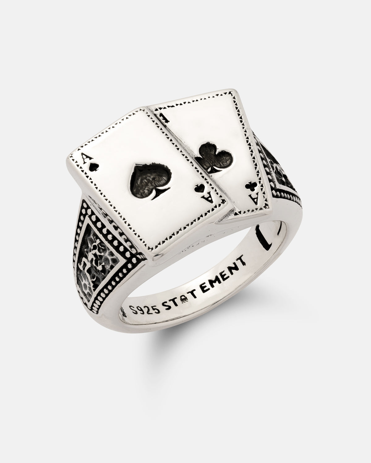 Statement Collective 925 Sterling Silver Pocket Aces ring with a top plate shaped like the ace of spades and ace of clubs, featuring engraved details on the band.